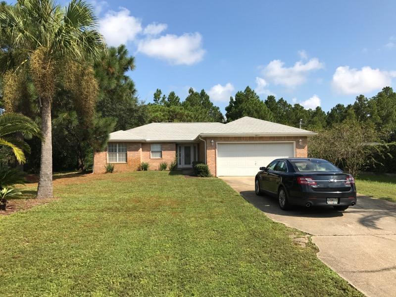 Fabulous all brick home that is open & bright with a split floor plan. This home offers beautiful great room with fireplace, plant ledges and French Door leading to an outside patio. The master bedroom has a large walk-in closet & the master bath offers a linen closet, over-sized separate shower and Jacuzzi tub. Fantastic kitchen w/gorgeous cabinets, granite counter tops, tiled backslash, bright breakfast nook, stove, dishwasher & breakfast bar. Contemporary home with 30-yr. dimensional shingles. Great location in Holley by the Sea. Home on public sewer, with features of a much larger home; yet maintaining a cozy and comfortable feel. Make this your home for the future, and enjoy the amenities of the lifestyle center of Holley by the Sea.