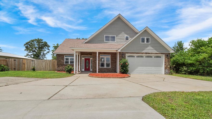 This stylish residence is nestled on a large level lot in a desirably tranquil location. Most repairs following Hurricane Michael have been completed. The few that remain will be completed prior to closing. The home comes with a welcoming open floor plan, kitchen/dining area, separate dining room, two full baths and one half bath, enormous living room complete with cozy fireplace, oversized first floor master bedroom, master bath with gorgeous tile floor and accents throughout and a large walk in closet. The living room is equipped with a charming fireplace and vaulted ceiling. The additional bedrooms and full bath are located upstairs. The exterior of the home is beautiful with attractive stone veneer siding, a huge two car garage and a magnificent in-ground pool to enjoy on those