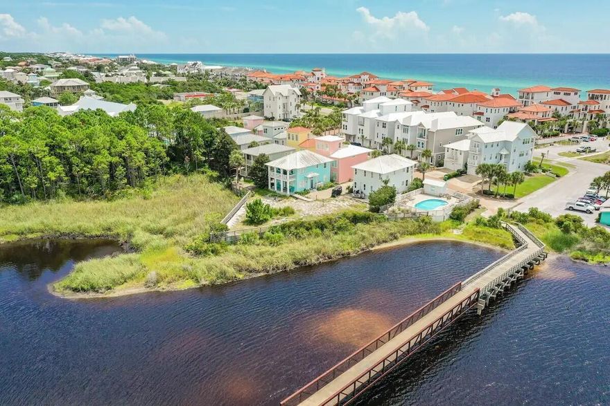 Don't miss this waterfront 30A house in the heart of Dune Allen Beach! Located on Oyster Lake and just steps away from beach access, this home offers the ultimate coastal lifestyle. Enjoy private porches on both floors with stunning views of Oyster Lake, then simply walk across the street to the beach. Inside, discover 10-foot ceilings, built-in bookcases, recessed lighting, + so much more! The expansive kitchen boasts GE stainless appliances, endless granite countertops, + more. With 4 bedrooms, including one downstairs, there's ample space for family and guests. The community pool is a true sanctuary, and nearby amenities include boutiques, dining, and ice cream shops. With newer paint, hardiplank siding, a metal roof, and dual A/C units, it's as durable as it is stylish. HURRY TO 30A!