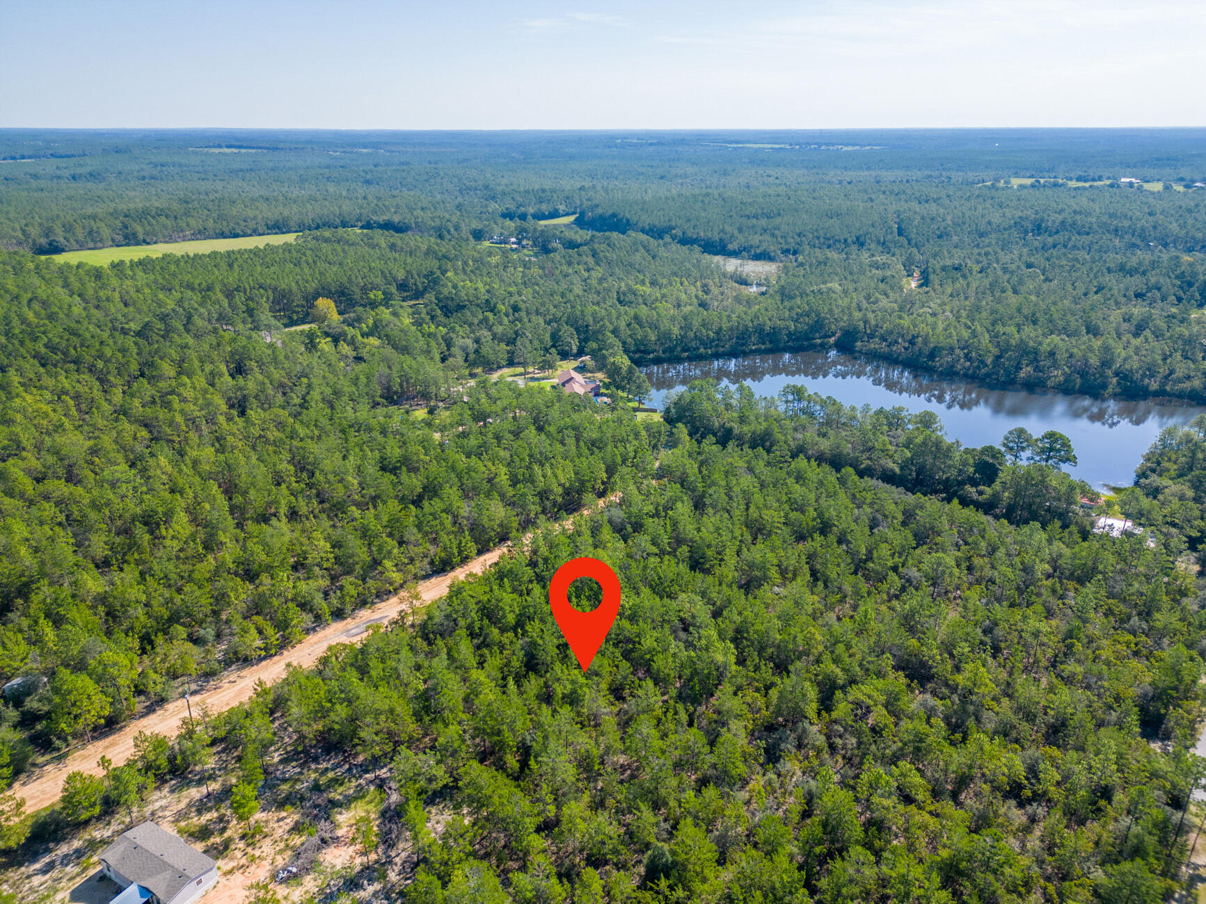 0.45 of an Acre Vacant Lot High and Dry, Non-Flood Zone. GREAT LOCATION! Mobile homes are allowed with No HOA Fees! This spacious lot offers convenient access to major highways (HWY 90, I-10, 285, and 331). HWY 90 is just under 2 miles away, and the DG Market Store is less than 4 miles away. Located approximately 12 miles from essential amenities like hardware and grocery stores, schools, downtown, and the historic Lake DeFuniak, this lot offers both convenience and tranquility.