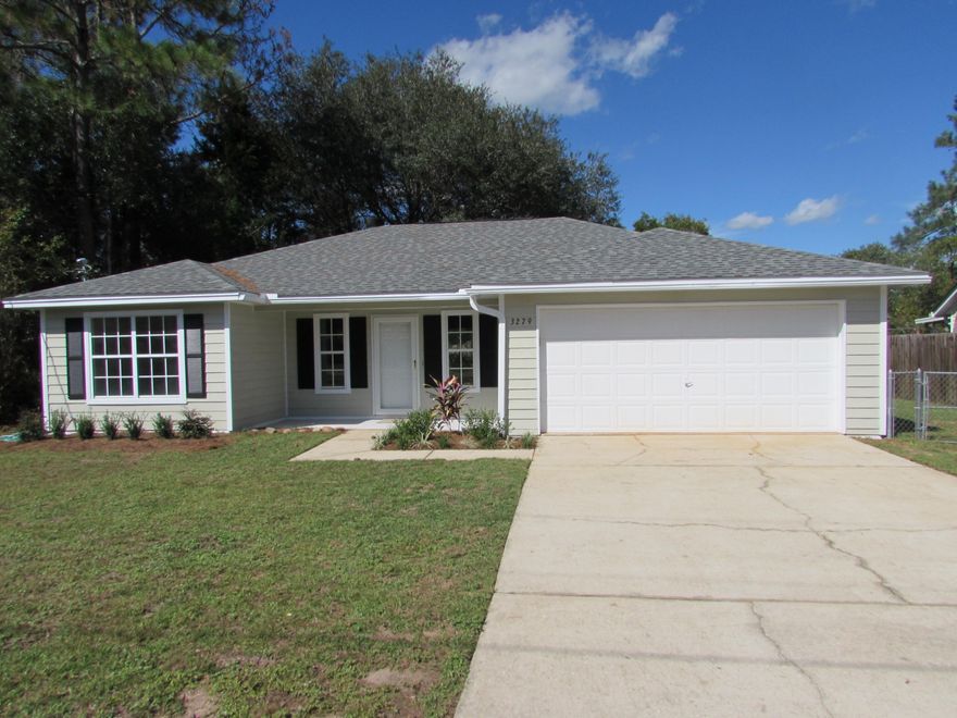 Looks like new and ready for you! Home has undergone a complete facelift! As you walk in the front door, you will notice new living room carpet and paint as well as a new ceiling fan. Living room has a fire place and the surrounding tile has been redone. The kitchen has new tile floors, new counter tops and sinks. Cabinets have been refaced. Kitchen appliances are also new including garbage disposal. Home has a dining area with tile flooring and a new fixture. Bedrooms have new carpet, paint and ceiling fans. Both hall and master bathrooms have new tile floors, new toilets, new countertops and fixtures. The yard has been cleaned up with new landscaping and a new mailbox put in place. Home has a fenced yard and yard building. Sellers will also be offering a termite bond.