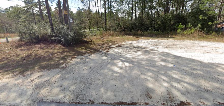 Vacant .43 acre parcel on the corner of PJ Adams Parkway and Villacrest Drive being sold separate from the remaining acreage. There is a conservation easement on the remaining property and wetlands that will limit potential development of the entire 10+ acres.