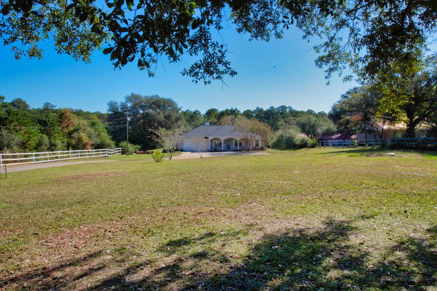 Beautifully renovated home situated on 1.96 acres in Crestview! Step through this gorgeous home featuring upgraded flooring throughout, full kitchen remodel with newer cabinetry, stainless steel appliances, and granite countertops! Upgrades continue through the bathrooms, with newer vanities, bathroom tiles, along with soaker tub replacement in 2022 with a granite surrounding. Additional touches including barn door, light fixtures, & shiplap. The home features a living area, well sized dining area, and sun room!Major systems including roof replaced in 2023, & HVAC in 2022. Garage door replaced in 2018. Schedule a showing today!*Buyer to verify all information