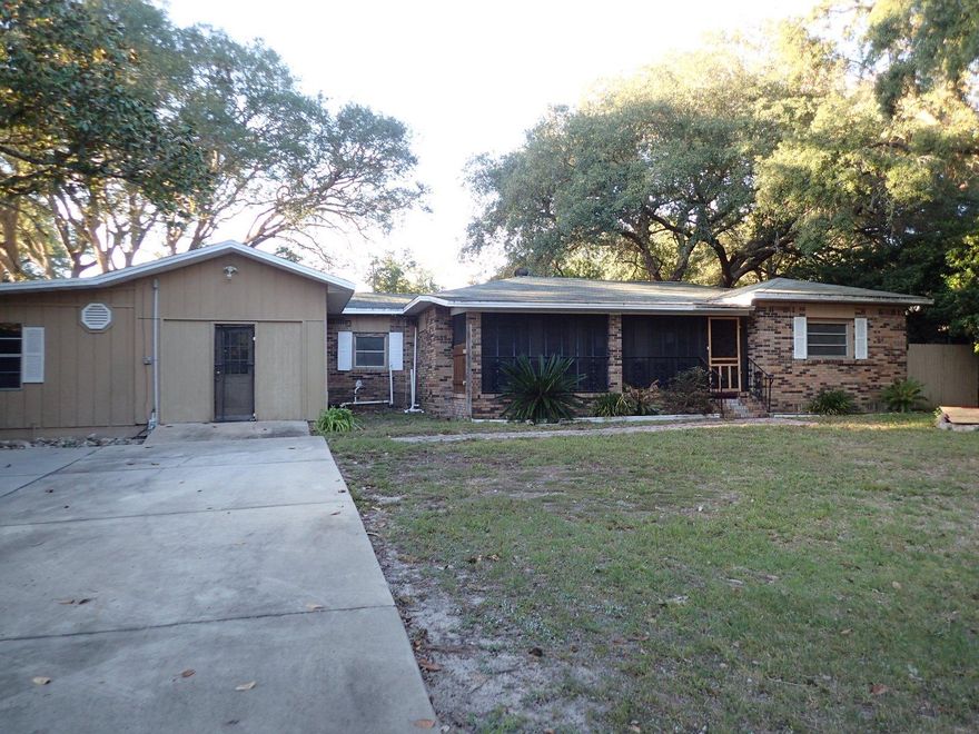 In the heart of Fort Walton Beach and walking distance to Choctaw High School. this REO home is worth the look. Tons of potential exist with this property that potentially can be used as a commercial site as well as residential housing. Built in 1953, this all brick home was originally a 3 bedroom 2 bath home, but was modified to create more living space and now has 6 bedrooms and 2 baths. A powered workshop boasts yet another 3rd bathroom. Home will only qualify for conventional financing, but at this price, you may indeed find a diamond. Call today.