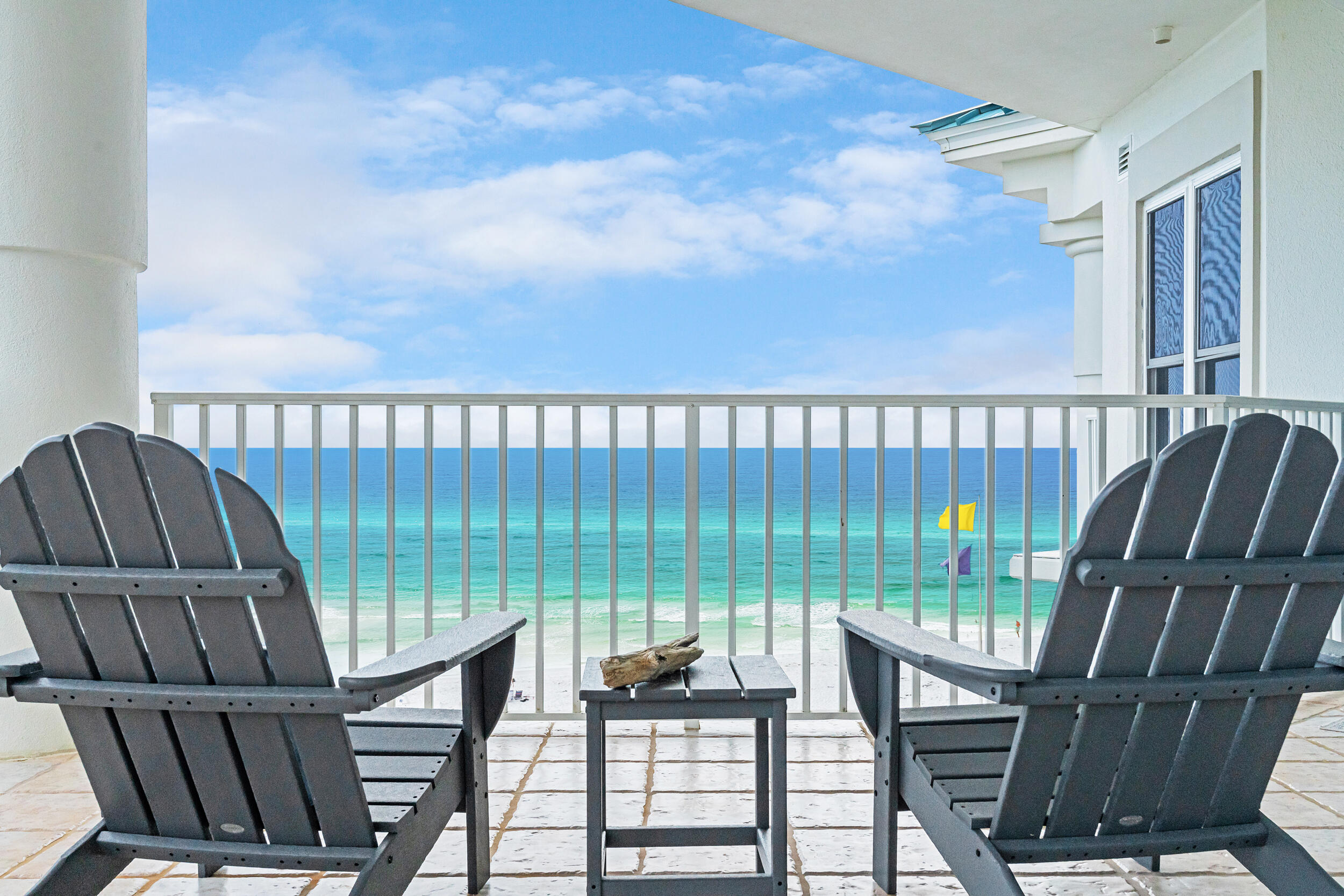 Welcome to Crabby Jack's, a beautifully remodeled top-floor corner unit at the Inn at Blue Mountain Beach and the only Gulf-front condo currently available in the building. With sweeping east and south-facing views of the emerald coastline, this rare opportunity won't last long. Units in this low-density building rarely come to market, the last few sold in 2021, making this a truly special offering on 30A.From the moment you step inside, you're greeted by breathtaking views and a spacious, open-concept living area that flows seamlessly to the large balcony. It's the perfect place to relax, unwind, and soak in the sights and sounds of the Gulf. Renovated in May 2021, the entire condo features all-new furniture, mattresses, and bed linens, creating a fresh, comfortable, and inviting environment for owners and guests alike.
Crabby Jack's comfortably sleeps more than most 4-bedroom units (including a charming bunkroom perfect for kiddos), making it an excellent investment with actual rental income of up to $100K since owners have managed. The primary suite is Gulf-front with balcony access and a luxurious bath that includes double vanities, a shower, and a whirlpool tub. Two guest bedrooms each have ensuite baths, one with a queen bed and one with a king, while the cozy bunkroom provides a fun and functional space for little ones to sleep and play.
Recent upgrades include impact-resistant doors and windows, offering peace of mind and durability. Guest reviews consistently praise the incredible views, thoughtful design, and comfortable accommodations, with repeat visitors calling it far superior to other units they've stayed in.
The Inn at Blue Mountain Beach offers unmatched amenities: 150 feet of private deeded beach access, a Gulf-front pool and hot tub, 50-foot atrium, fitness center, two elevators, open and covered parking, individual storage cages, and beach service. With only 48 units and a recent $1.6M renovation, this well-maintained and secure building is one of the best-kept secrets on 30A. Crabby Jack's is not just a beach condo, it's a coastal retreat you'll never want to leave.