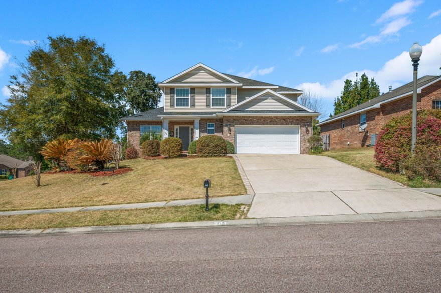 Perched on a prime corner lot in the sought-after Woodridge community, this 4-bedroom, 2.5-bathroom home offers an unbeatable combination of privacy, space, and modern updates--all with NO HOA! Plus, a brand-new roof with peel-and-stick underlayment could help lower homeowner's insurance costs. And a VA assumable loan at an incredible rate is available for qualified VA buyers. Step inside to an inviting two-story layout where soaring ceilings and natural light fill the living space. The elegant gas fireplace with tile surround serves as a cozy focal point, while rich hardwood floors flow seamlessly through the living area and into the private primary suite, which is tucked away behind the living space for the ultimate retreat. The kitchen is as functional as it is beautiful, featuring warm granite countertops, a breakfast bar, breakfast nook and tile flooring that extends from the entryway through to the kitchen for easy maintenance. The primary suite boasts an enormous walk-in closet, double vanities, a luxurious jetted soaking tub, and a separate showerperfect for unwinding after a long day.

Upstairs, you'll find three generously sized bedrooms, a full bathroom, and a hidden reading nooka charming and versatile space for book lovers or quiet relaxation.

Located in the heart of Niceville, this home provides easy access to top-rated schools, parks, shopping, and dining. With its prime location, premium features, and rare assumable loan opportunity, this home is a must-see!
Don't waitschedule your private tour today!