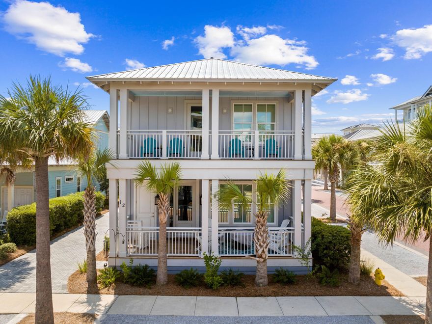 Welcome to your dream coastal retreat, nestled on a prime corner lot in the highly sought-after Seacrest Beach community. This stunning beach home, never rented and meticulously maintained by its original owners, offers the perfect blend of luxury, comfort and convenience. With four spacious porches, each equipped with misters and fans, this home is designed for outdoor living at its finest. This elegantly furnished property is ideal for a primary residence, vacation home or rental investment. Inside, you'll find exquisite fixtures and finishes, including polished hardwood floors and a gourmet kitchen with quartz countertops and high-end KitchenAid appliances. The open-concept living area is perfect for family gatherings, featuring an informal dining room that seats 10 and additional seating at the kitchen island, all beneath charming pendant lighting. The home boasts two master suitesone on each flooralong with a queen guest suite, a bunk room with built-in bunks and a second bunk room with a twin over queen. Every detail has been thoughtfully considered, from the generous laundry room to the ample outdoor storage space. The outdoor kitchen and expansive porches provide ample space for entertaining after a day spent at the largest community pool on 30A or the nearby deeded Seacrest Beach. With the convenience of tram service to and from the beach, 24-hour security, and easy access to Seacrest's shopping and dining, this property is truly a rare find. Additionally, the home's landscaping features six fruit trees, adding to the charm and appeal of this exceptional residence. This is a unique opportunity to own a piece of paradise in Seacrest Beach, where you can enjoy the perfect balance of tranquility, luxury, and proximity to all the best that 30A offers.