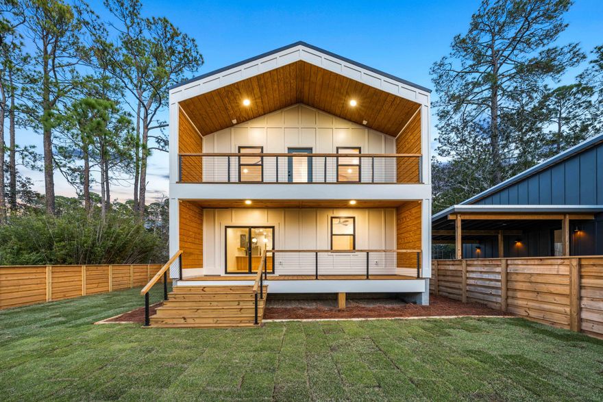 Waterfront living under $600K in Santa Rosa Beach is almost unheard of.This modern coastal home offers direct access to Hogtown Bayou and a flexible layout that opens the door to income potential, multigenerational living, or a smart long-term investment.Built by Sunset Homes, the residence is thoughtfully designed across two levels, each functioning as its own complete living space with separate entrances. The lower level features a full kitchen, living area, bedroom, bathroom, and laundry. Upstairs, you'll find two bedrooms, a full bathroom, a second kitchen, laundry, and an open living area that flows onto waterfront balconies overlooking Hogtown Bayou.Step outside and enjoy the kind of waterfront lifestyle buyers along 30A are always searching for. Launch a boat, canoe or kayak directly from your backyard and cruise the bayou with ease. Two exterior balconies face the water, creating ideal spaces for morning coffee, sunset views, and relaxed coastal evenings. The fenced and sodded yard, concrete driveway, and one-car garage with lockout and separate exterior entry add convenience and privacy rarely found at this price point.

Finished with Anderson windows, a Hardie board exterior, tile kitchen backsplash, and a modern contemporary design with a coastal flair, this home balances durability, style, and low-maintenance living.

Located just down the street from the Cessna Landing boat launch and park, and minutes from Gulf Place, Ed Walline Beach Access, and popular local spots like Shunk Gulley, The Perfect Pig, Papa Surf Burger Bar, and Shelby's Beach Bar, the location delivers both waterfront serenity and everyday convenience.

Whether you are searching for a full-time residence, a second home, or a property that offers flexibility and income potential, this is a rare chance to secure waterfront living in Santa Rosa Beach at a price point that continues to shrink along 30A.