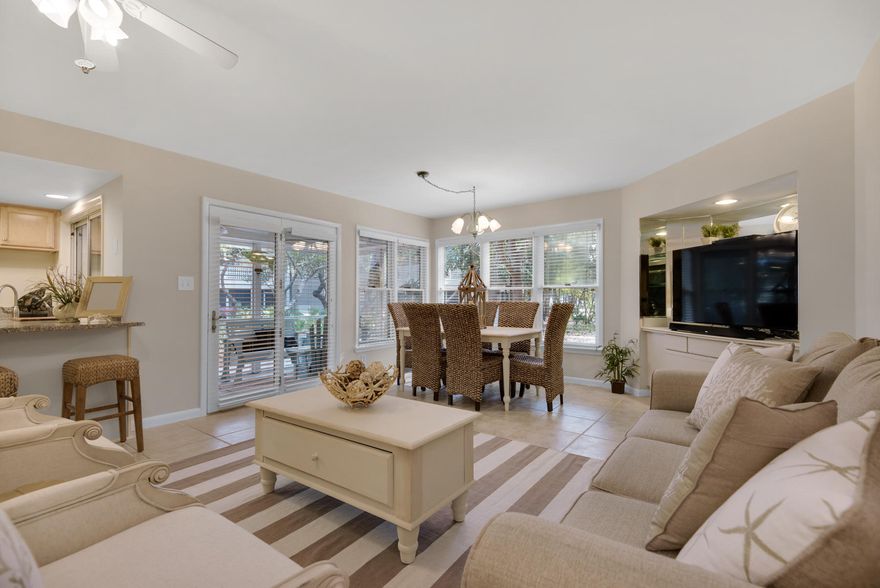 Searching for an ideal beach cottage? You've found it! This unit is just steps to the beach and also to the tennis center that Hidden Dunes is so well known for. The sellers have put lots of love into this unit including an updated kitchen, fresh paint, granite counters, scraped ceilings, and new designer furnishings. It is rare that one of the units overlooking the fountains becomes available. They can be viewed from the screened in porch, kitchen, living room and dining area & the unit is nestled between all the mature lush landscaping. The sellers have decorated this unit with excellent taste with attention to detail and easy maintenance. This lovely unit has a large master bedroom with a nice master bath. On the other side of the foyer is another bedroom with a full bath just...