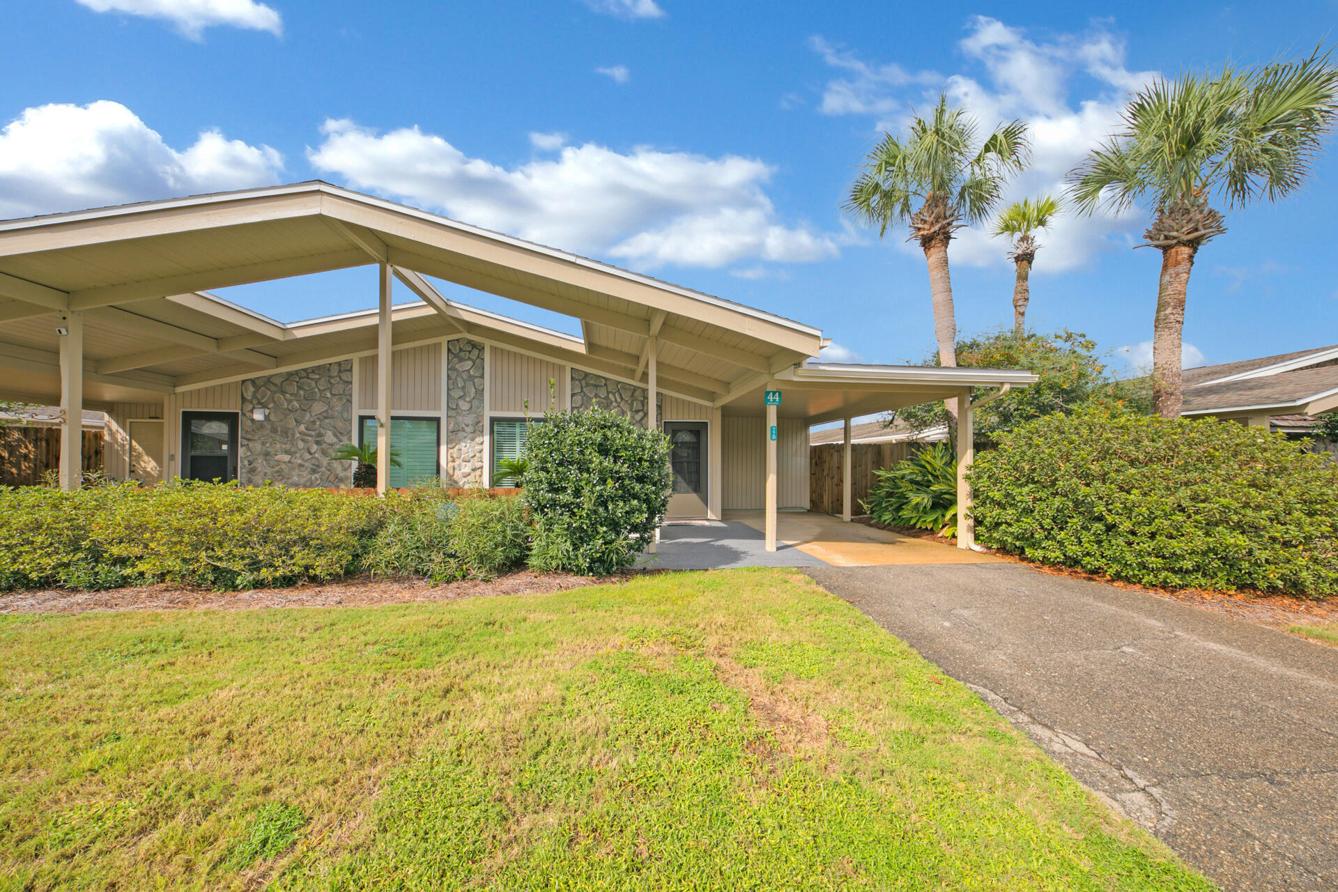 Highly sought after Tennis Village within the gated golf and tennis community of Seascape Resort. This unit is steps away from tennis courts and the only heated pool of the 4 available in the complex. Other amenities include pickle ball courts, 7 minute walk to the Seascape Deeded beach plus the dedicated beach parking and renowned Whales Tail Restaurant/Bar. This is a turn key unit which has a private court yard, personal carport with electric waiting for your golf cart, washer dryer, Wemo wifi dimmable LED lighting, vaulted ceilings, new impact resistant windows including a new sliding door (2020), remodeled bathroom (2019), ecobee WiFi thermostat (2020), and wonderful quiet dead end street for adults and kids.