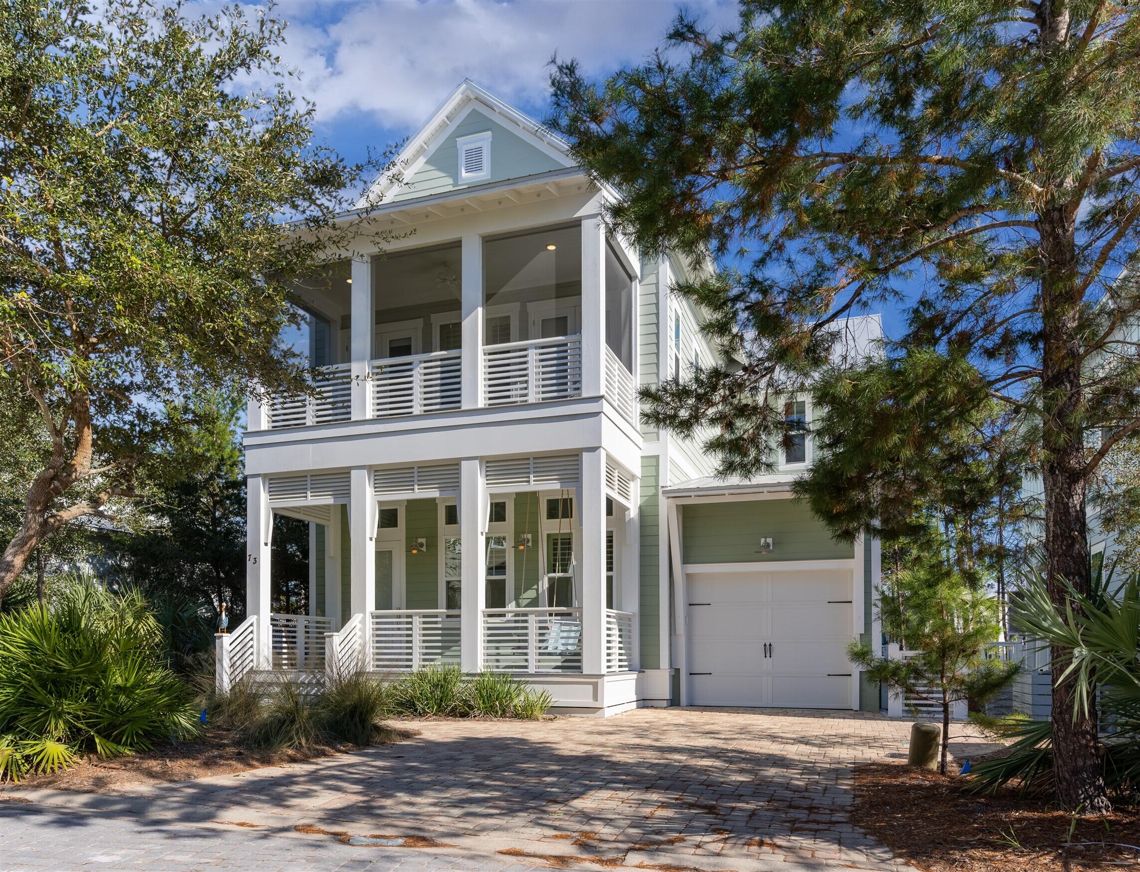 NEW PRICE !!!Beautiful Beach Home in Highland Parks located at Blue Mountain Beach.This LARGE home is perfect for full-time residence, vacation home or investment property. One of the largest plans in the community with 4 bedrooms and 4.5 baths, including 2 master suites.. Three screened porches offering a tranquil space to relax and enjoy nature and the preservation area. This home has one of the best lots in the neighborhood including a large fenced in back yard. High end stainless steel appliances, beautiful granite counter tops and hardwood floors throughout. Many upgrades, including Lutron Lighting System, LED Can Lighting, and gorgeous new light fixtures. There is a huge storage area located under the home. Home Sold Furnished. Golf Cart and 2 Electric Bikes Do NOT Convey.