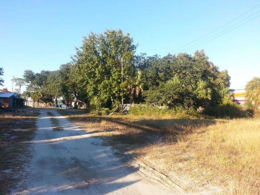 Duplex unit on property, currently rented month to month. One side is two BR one bath, other is a One BR one bath.
All concrete block construction and tile floors. Property is ripe for further retail or multi-family development zoned for either.