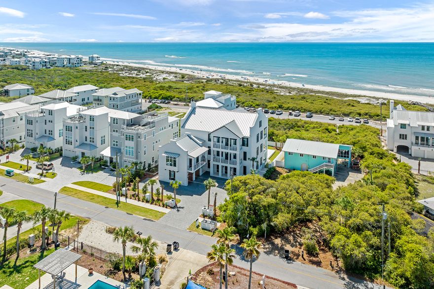 73 Pompano Street stands as an architectural triumph where luxury meets coastal elegance. This magnificent 8-bedroom estate, crafted by renowned architect Chris Stoyles with interiors by Heather Wilcox, offers an unparalleled retreat just moments from the Gulf's edge in coveted Inlet Beach--widely celebrated for its uncrowded, pristine beaches.Entertaining becomes an art form within these walls. The third-floor great room dazzles with soaring vaulted wood beam ceilings and walls of glass that disappear to unite indoor and outdoor living. Here, a chef's kitchen with premium Monogram appliances, dramatic fireplace, and full featured bar create the ultimate gathering space, flowing seamlessly to an expansive covered balcony with summer kitchen and fire pit lounge. Resort-style indulgence defines the outdoor sanctuary, featuring a 30' heated pool with waterfall and fire elements, a covered spa retreat, and a summer kitchen - all within a private walled yard that offers a rarity along the coast: generous space to truly spread out.

Luxury accommodations abound, including two primary suitesone with direct pool deck access, another with sweeping Gulf views. Three additional Gulf-facing guest suites and flexible bunk spaces, including a spectacular fourth-floor hideaway with panoramic vistas, allow multiple generations to gather in comfort. Throughout this extraordinary residence, no detail has been overlooked: Abundant parking, sonos sound system, elegant framed TVs, an elevator serving three floors, tankless gas water heaters and multi-zoned climate control elevate the everyday experience.

Located within minutes of the architectural wonders of Alys Beach, the charm of Rosemary Beach, and the refined shopping at 30Avenue, 73 Pompano Street isn't merely a home - it's a coastal masterpiece designed for those who refuse to compromise.