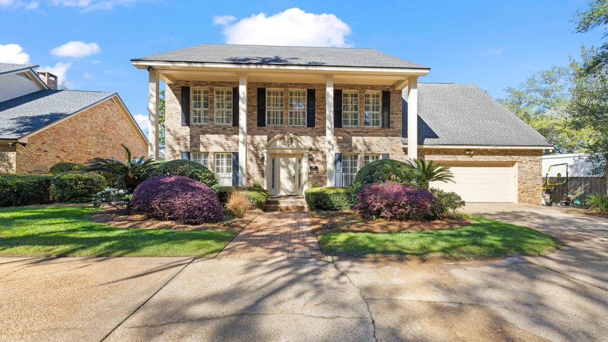 Welcome to 217 Yacht Club Drive, a stunning waterfront home in Fort Walton Beach offering timeless charm and beautiful water views along Florida's Emerald Coast. This stately two-story brick home features a classic columned facade, manicured landscaping, and inviting curb appeal. This location was originally selected as the personal 'fish camp' for the Hughes family, who owned much of the surrounding land at the time--adding a unique piece of local history to this special location. Enjoy a backyard oasis with a sparkling pool overlooking the water, perfect for relaxing or entertaining. Just minutes from shopping, dining, and the white-sand beaches, or a short boat ride to the fishing and entertainment of Destin.