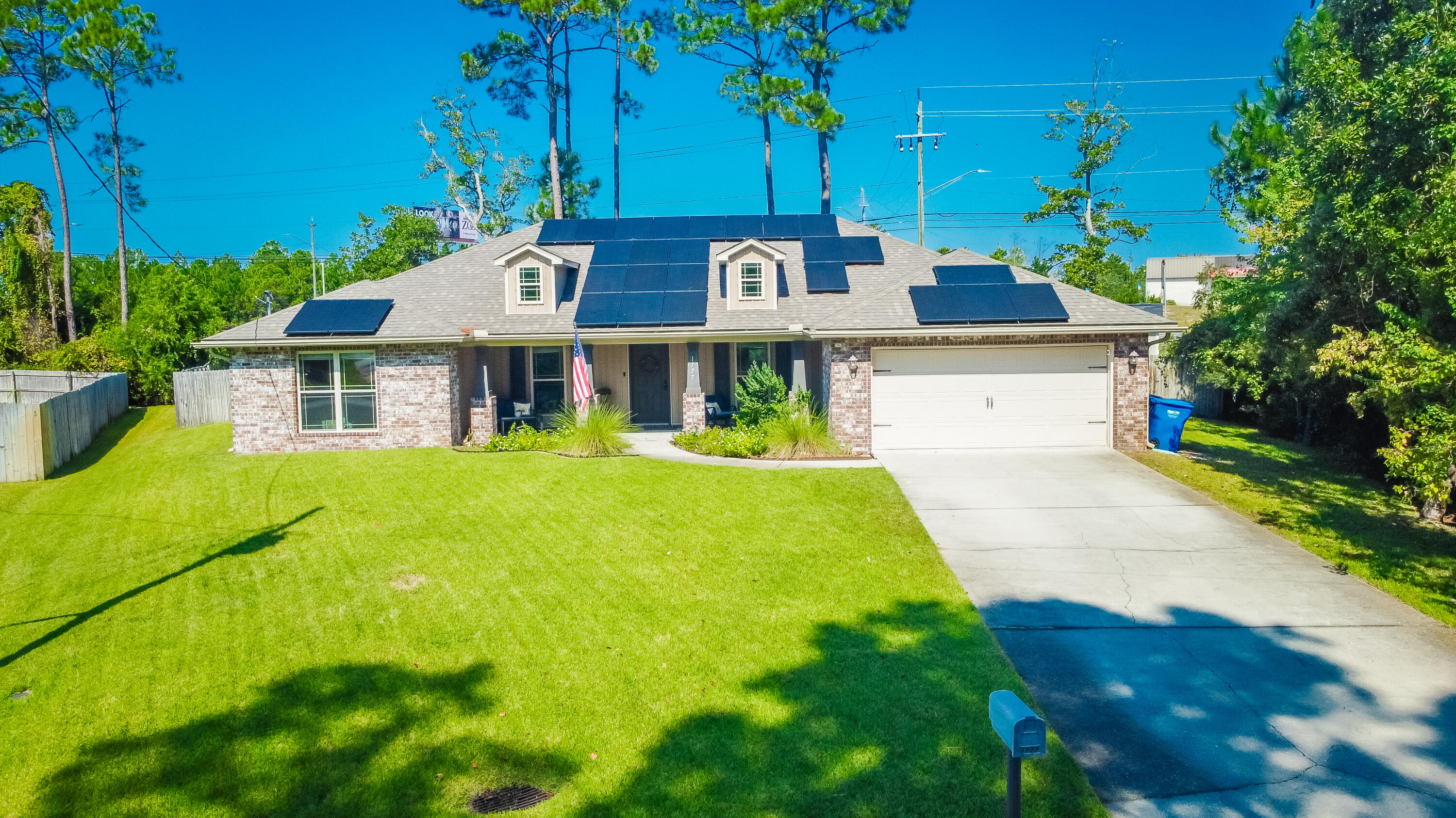 Assumable VA loan, 2.99%! Beautiful home on a spacious lot in Navarre! Recent updates include new shower & carpet in owner's suite, fresh paint throughout & new dishwasher. The home boasts fully paid off solar panels, sprinkler system on well, covered patio & front porch, & fenced backyard with a shed & hedges to provide natural privacy barrier to Hwy 98 once matured. Inside you will notice vaulted ceilings, large, open kitchen with breakfast bar, stainless steel appliances, & granite countertops, along with a spacious owner's suite, separate from the other bedrooms. The neighborhood features a community path to the sound with access for kayaking, fishing, etc. The home is located within a mile of shopping & restaurants, within 5 miles of Navarre Beach & within 14 miles of Hurlburt Field.