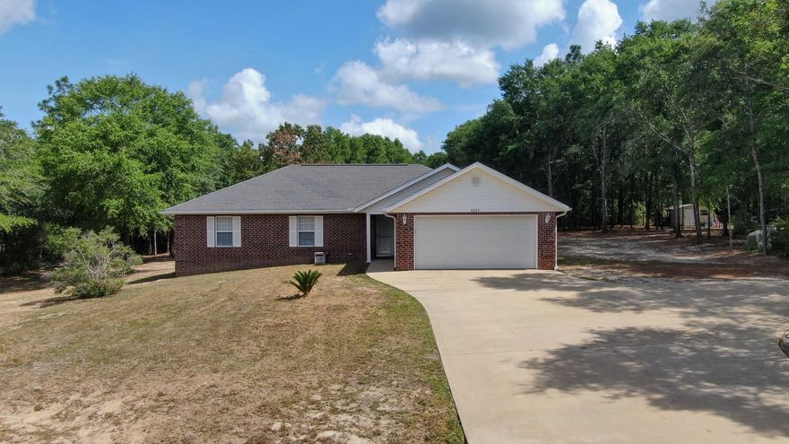 Back on the market at NO fault of the seller!Beautiful brick home with 1833 sq. ft. in a county setting, Large backyard, this property has just over an acre of land, home features 3 bedroom and 2 baths, Large master bedroom with walk in closet, Tile Foyer, Kitchen, Dining, Baths and Laundry, updated dimming LED lighting, French drain, Storm door, Gutters, Full walk thru attic w/pull down stairs, Garage wired with 220 for shop tools. Note: washer, dryer and garage refrigerator do not convey. Buyer shall verify measurements deemed necessary.