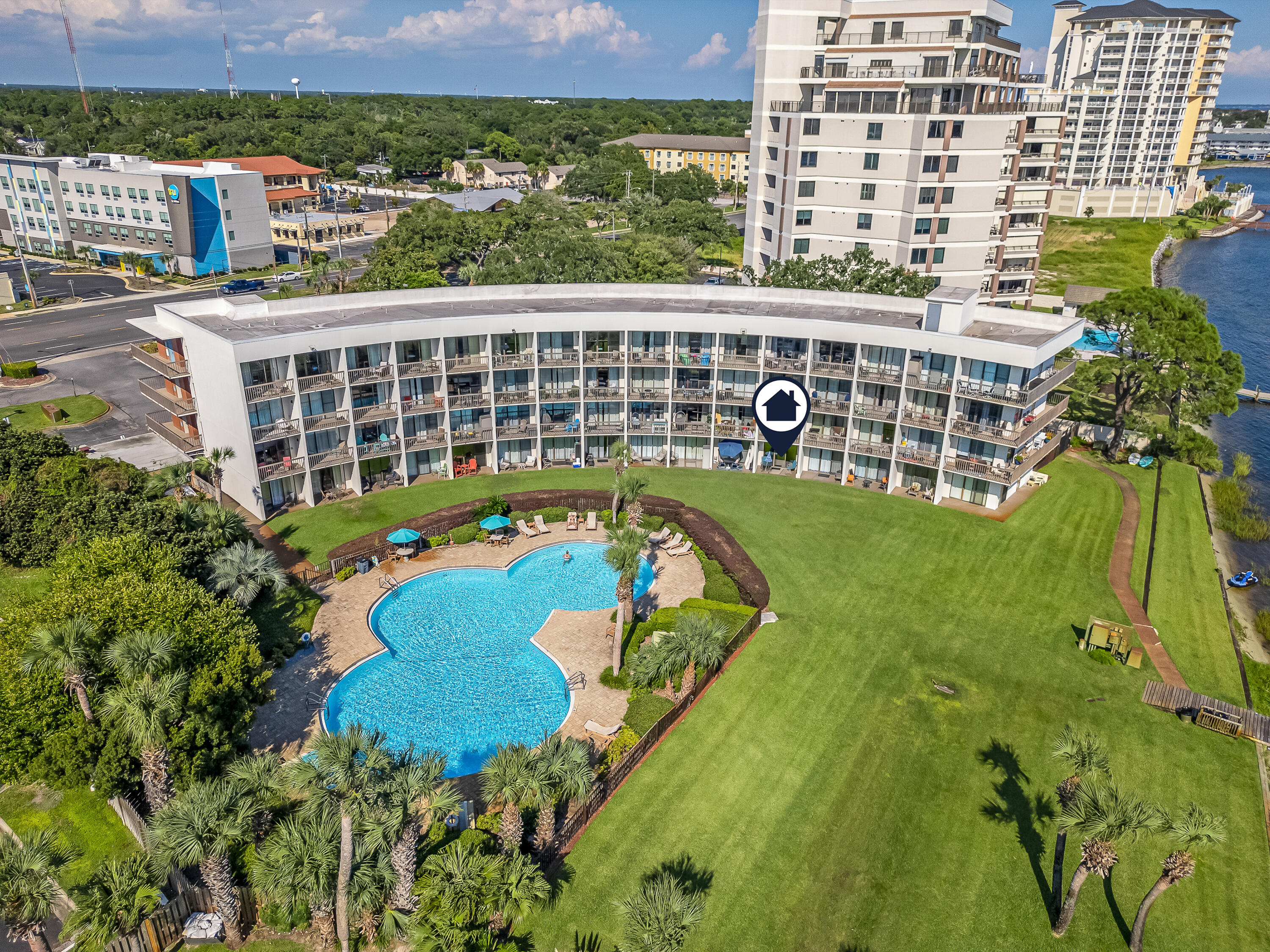 Step into this first-floor studio condo that offers more than just a home--it's a lifestyle. With two sparkling pools and your very own private dock that supports a 28-foot boat, your days are designed for adventure. Launch straight into the Intracoastal waterways or set your course for the Gulf's turquoise waters, where waterfront dining, hidden coves, and even the world-renowned Crab Island in Destin await.Whether you prefer to keep this retreat all to yourself or share it as an investment, the option is yours--short-term rentals are allowed, making it as versatile as it is inviting.The location is unbeatable. Minutes from Fort Walton's best eateries, beaches, clubs, and entertainment, every day feels like vacation. Spend your afternoon lounging by the pool or exploring on the water, then return to refresh before walking over to Jade's for an unforgettable meal. Sway to live music at the tiki bar, and when the night calls, head downtown to soak in Fort Walton Beach's lively scene, whether it's Jake & Henry's, Coasters, or Soundside, the energy is endless.
Affordable, convenient, and full of coastal charm, this condo gives you the chance to make your vacation lifestyle a reality. Welcome home.
