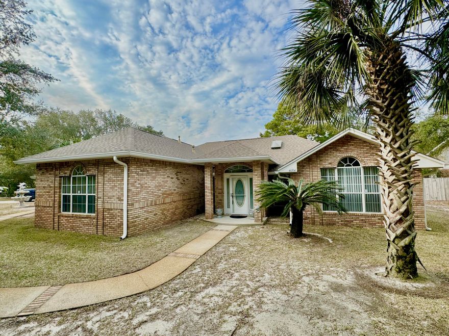 Step into a world of possibilities with this custom-built home in the heart of Destin. Originally constructed to surpasses every standard, this residence is a celebration of meticulous care and unique architectural details that redefine coastal living.Positioned on a tranquil, low-traffic street, opposite waterfront homes along Indian Bayou, this home offers an unparalleled retreat for those who appreciate the extraordinary. Boasting a rare 3-car garage, the residence opens its doors to a split floorplan, ensuring privacy, while the spacious master suite becomes a sanctuary of sophistication.The open living area is a symphony of natural light, featuring vaulted ceilings and bespoke design elements that create an ambiance of refined elegance.
