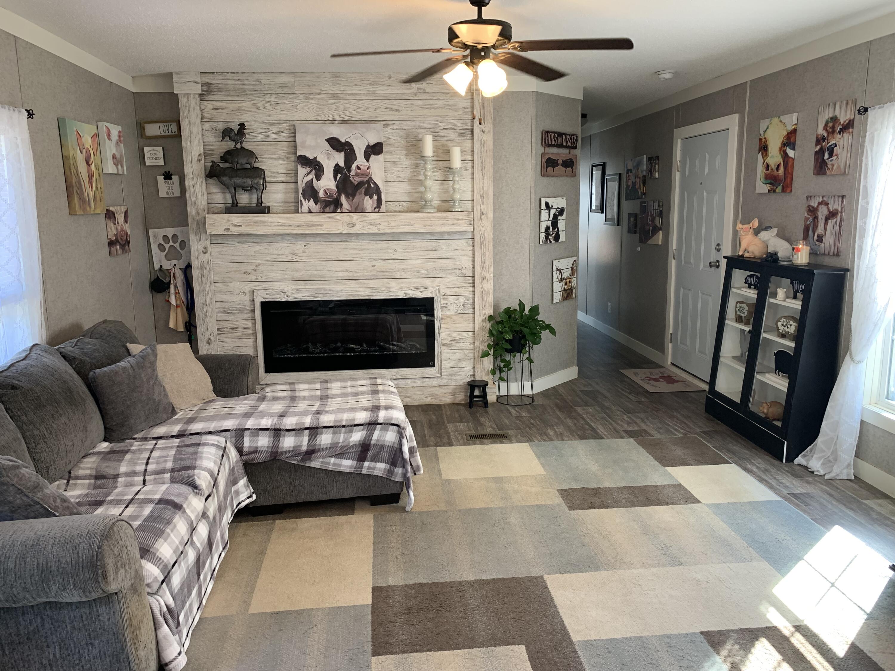 🍁 Embrace Fall in Your New Home! 🍂 Discover the perfect 1/4 acre property, complete with a pristine 2020 mobile home This home boasts 3 well sized bedrooms and two baths and it's just waiting for you to call it your own. Nestled in a serene, quiet neighborhood, this oasis is centrally located between DeFuniak Springs and Crestview ensuring convenience at your doorstep. 🏡 Your Dream Home Awaits: ✨ A 2020 mobile home in impeccable condition ✨ Spacious 1/4 acre property ✨ Privacy fence for tranquility and security,Sturdy decks on front and rear of home, an electric fireplace in the living room, and block island in the updated kitchen. Washer and dryer are staying! Central location for easy access to all your needs! Don't miss out on this incredible opportunity to own a move in ready home!