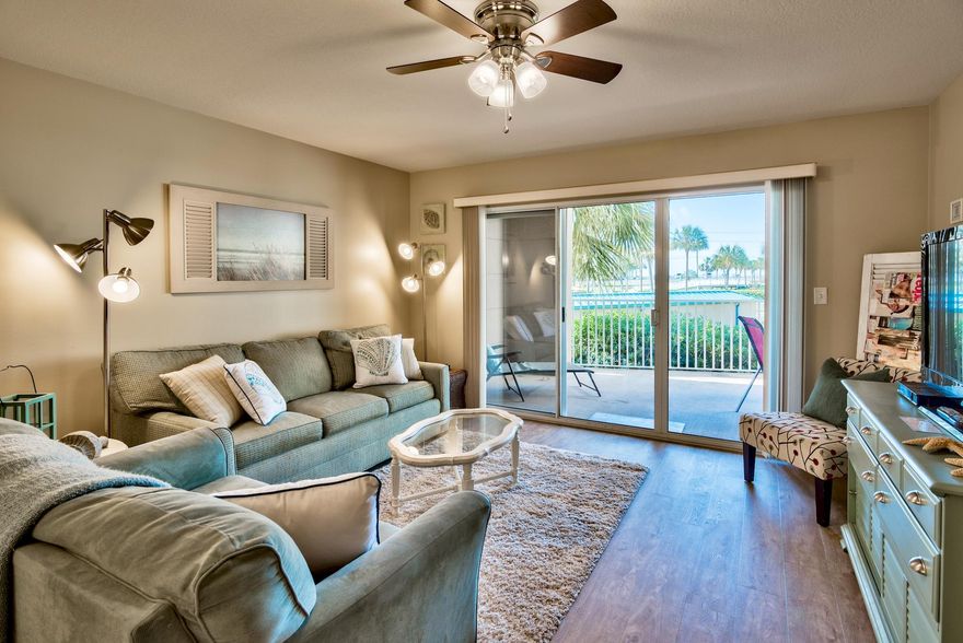 This beautiful two bedroom condo is on the first floor over the parking garage providing easy access to everything. With two large bedrooms and bunks in the hallway, you can easily enjoy your own space. This condo has a proven rental record and has been updated. The two large pools, tennis courts and beach access are all perfect for spending time outdoors. The kitchen has granite counters, the living room has new flooring and updated furniture. You'll love this condo! The community is secure and is close to shopping.