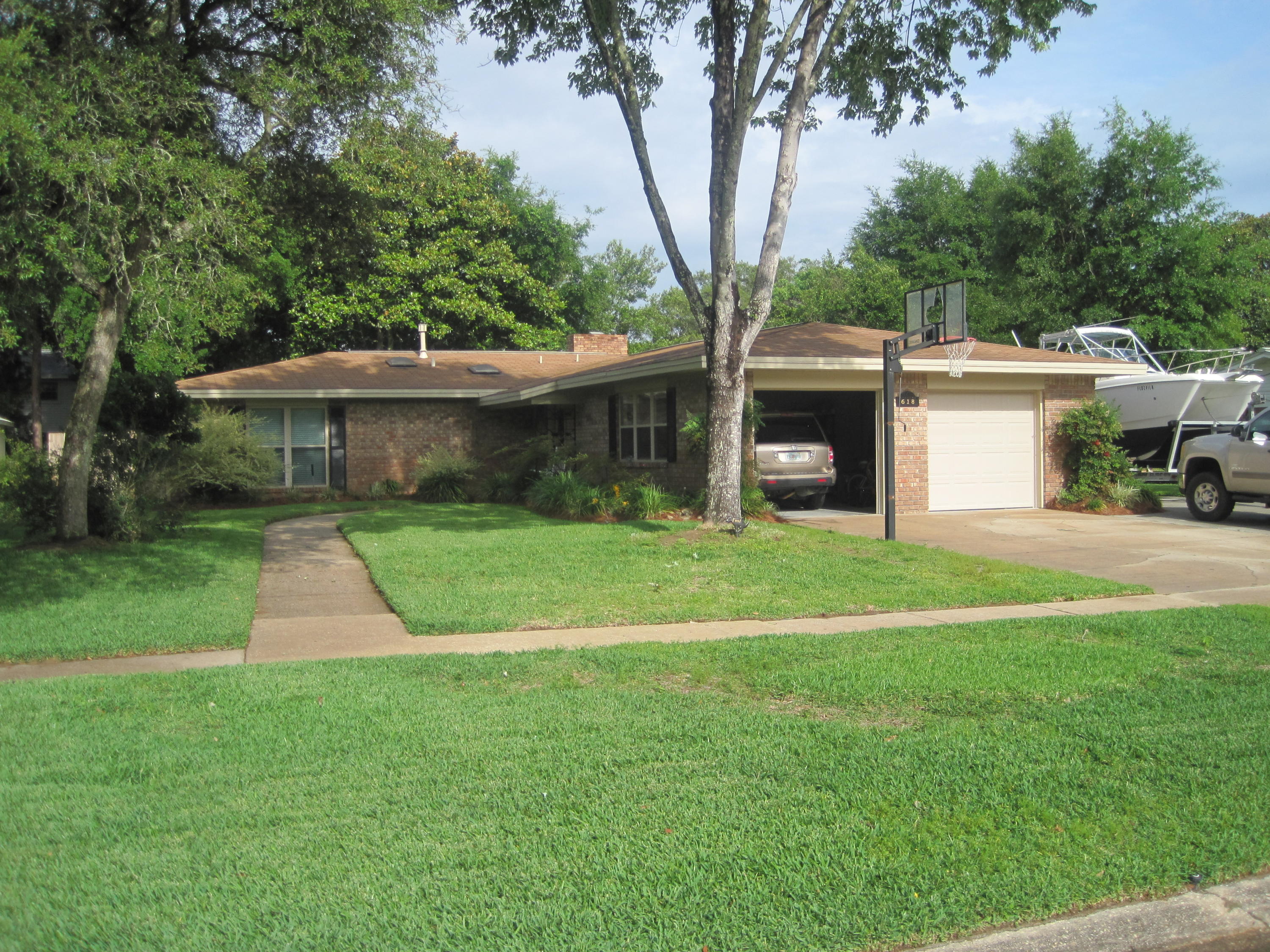 Perfect location! Located directly around the corner and within a minute walk to Kenwood Elementary. House features 3 bedrooms and 2 bathrooms, 2 living areas, and a large office/sunroom (could easily be turned into a 4th bedroom). Plenty of additional parking for an rv or large boat. Backyard is perfect for entertaining and features an inground pool, landscaping, and kids tree house. House was purchased in 2008 and has been extensively updated/remodeled since that time. Some of the renovations include: copper wiring, electrical panels, fans/lights/recessed lights, plumbing, kitchen/bathrooms, tile/wood flooring (no carpet), irrigation/landscape, heated saltwater pool, privacy fence, insulated garage doors, windows/exterior doors, all interior trim (baseboards, crown molding, doors), etc