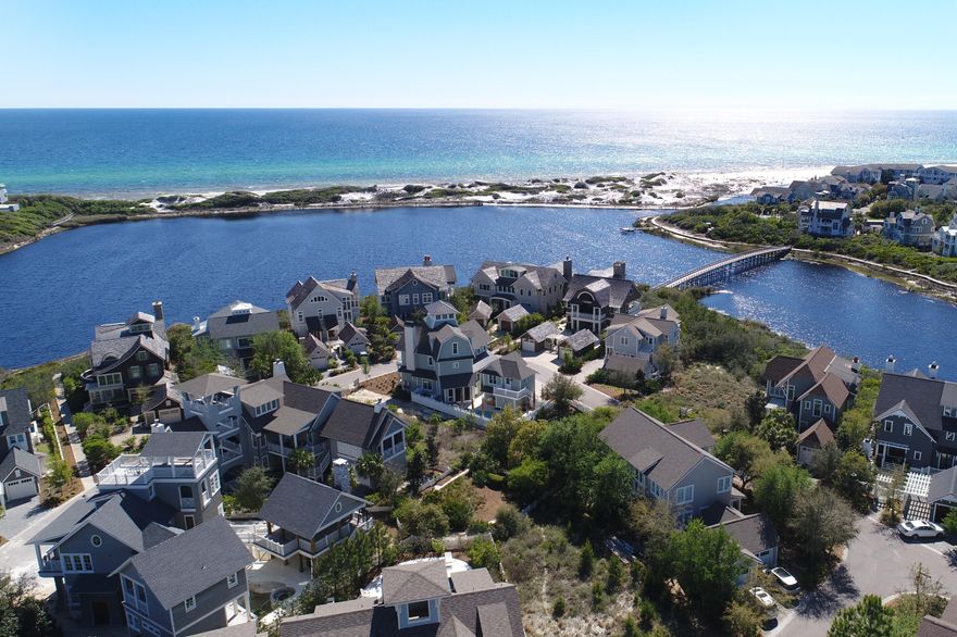 Coastal dune lakes are extremely unique, and this lakefront lot awaits your very own home design in the charming gated-community of WaterSound Beach. This spectacular property and incredible amenities that come withcan be yours. Walk or hop on your bike to enjoy community pools, restaurants, boardwalks, friends, neighbors and enchanting pedestrian bridges that wind over and through the white sand dunes. The security entrance lends a measure of comfort, and this lovely lot sits on a coastal dune lake, ready for your personal style, your stamp of approval, your unique Florida home.