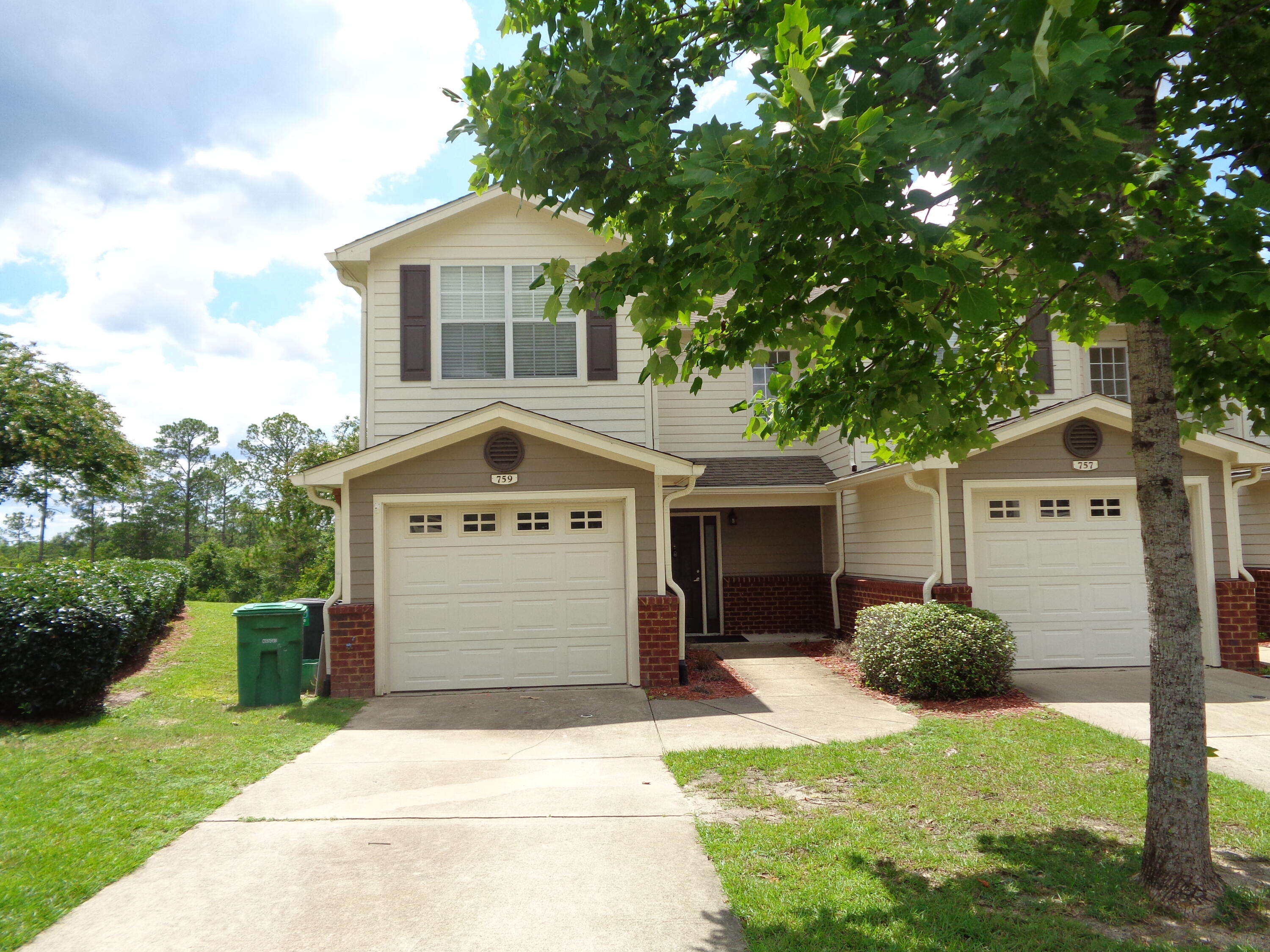 BACKS TO THE PRESERVATION AREA!  In Eagles Landing a highly sought after community! HVAC REPLACED OCTOBER 2020. KITCHEN APPOINTED WITH STAINLESS STEEL APPLIANCES. 3 bedroom, 2.5 bathroom with a single car garage, under stairs storage. Lots of crown molding, ceiling fans in living and bedrooms. Master has a good size bathroom and walk-in closet, the two spare bedrooms have a walk in closet too. Kitchen appliances to include stove and  microwave, refrigerator, and disposal. Living room has wood look tile. Measurements are approximate, buyer to verify all information listed. Community pool and lawn maintenance. Selling Brokerage & Eagles Landing Townhomes are owned by the same parent company.