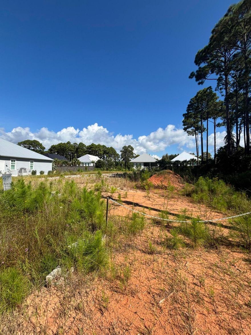 Been cleared in the past 5 years.  Great lot for building your dream home.  Lot is 100x150.  Close to the beach and Santa Rosa Golf Blub.