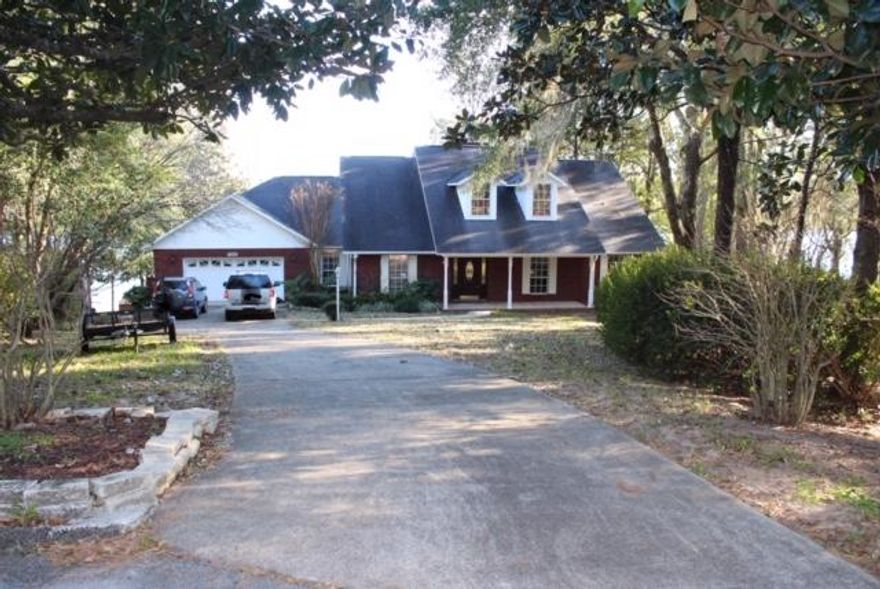 Beautiful Lake Front 4 Bedroom, 3.5 Bath, 4,680 sq. ft. home located on Lake Holley in Defuniak Springs Florida. Home has view of lake from all bedrooms and living / kitchen areas. The kitchen features granite counter tops and stainless steel appliances. The master suite features a sitting area, a jetted tub, and a large walk-through closet. This home is very spacious, including a large screened-in-porch. The property includes a dock with benches for viewing the lake and a sink for cleaning your catch. This home is a MUST SEE!!