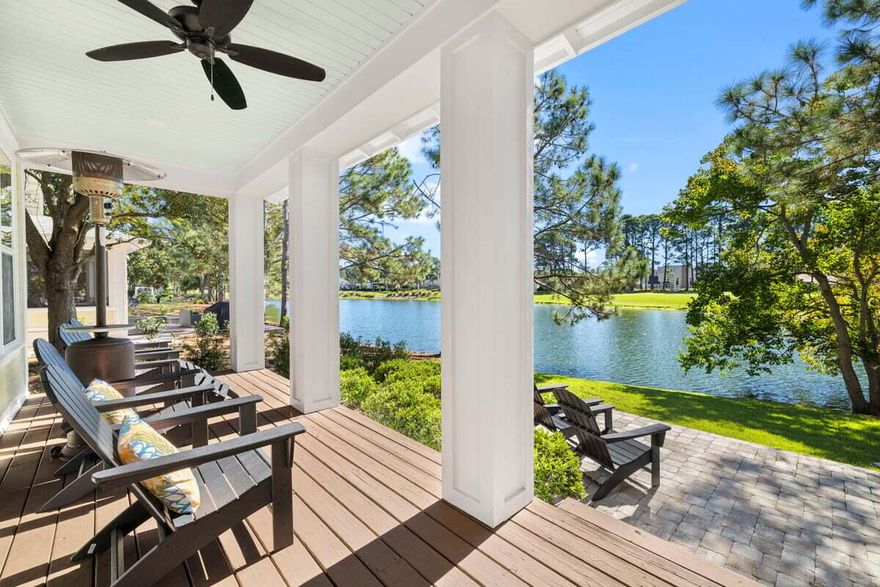 Discover this stunning remodel in Laurel Grove that you simply must see to believe! Every aspect has been thoughtfully updated. Envision yourself in a bright, airy kitchen with sparkling quartz countertops, seamlessly flowing into a stylishly furnished living area. Through the new windows, you'll gaze upon a shimmering lake and the fairway beyond. The upgraded bathrooms offer a dazzling, spa-like experience, and the master bedroom, conveniently located on the main level, provides a peaceful retreat with direct access to an inviting backyard oasis. . Mature landscaping envelops the property, all expertly maintained by the HOA. You'll find optimal storage with ample closet space and an attached shed . Rarely found are the premium private parking pads that fit 2 cars and 2 golf carts. Boom!