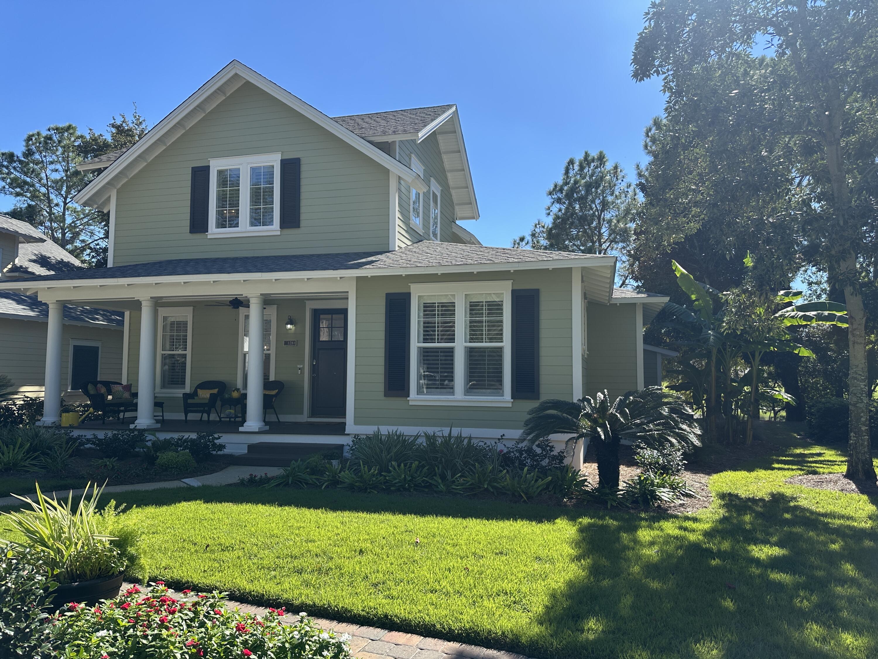 Discover this stunning remodel in Laurel Grove that you simply must see to believe! Every aspect has been thoughtfully updated. Envision yourself in a bright, airy kitchen with sparkling quartz countertops, seamlessly flowing into a stylishly furnished living area. Through the new windows, you'll gaze upon a shimmering lake and the fairway beyond. The upgraded bathrooms offer a dazzling, spa-like experience, and the master bedroom, conveniently located on the main level, provides a peaceful retreat with direct access to an inviting backyard oasis. . Mature landscaping envelops the property, all expertly maintained by the HOA. You'll find optimal storage with ample closet space and an attached shed . Rarely found are the premium private parking pads that fit 2 cars and 2 golf carts. Boom!