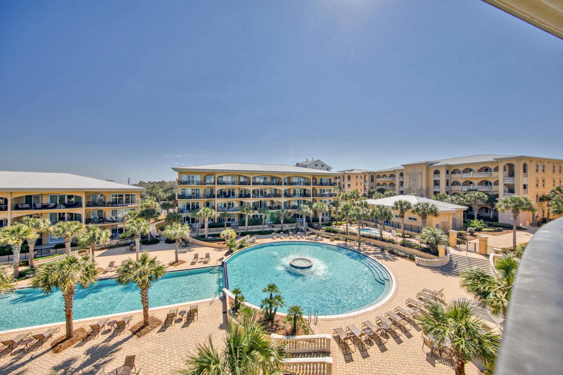 Top floor unit with new updates throughout features 3 bedrooms and 3 baths and a large balcony that overlooks the incredible resort style pool.  Professionally decorated to create a coastal chic ambience throughout!  Upgrades include custom draperies, crown molding, luxury vinyl plank ''wood look'' floors in all bedrooms, French door refrigerator and free standing beverage cooler.  Wifi enabled Carrier infinity HVAC features remote programming and controls both temperature and humidity levels with a costal package providing he highest level of protection for marine environments.  Adagio amenities include 600 feet of beach from access, umbrella and chair service, heated beach front infinity pool, fitness center and gated access.