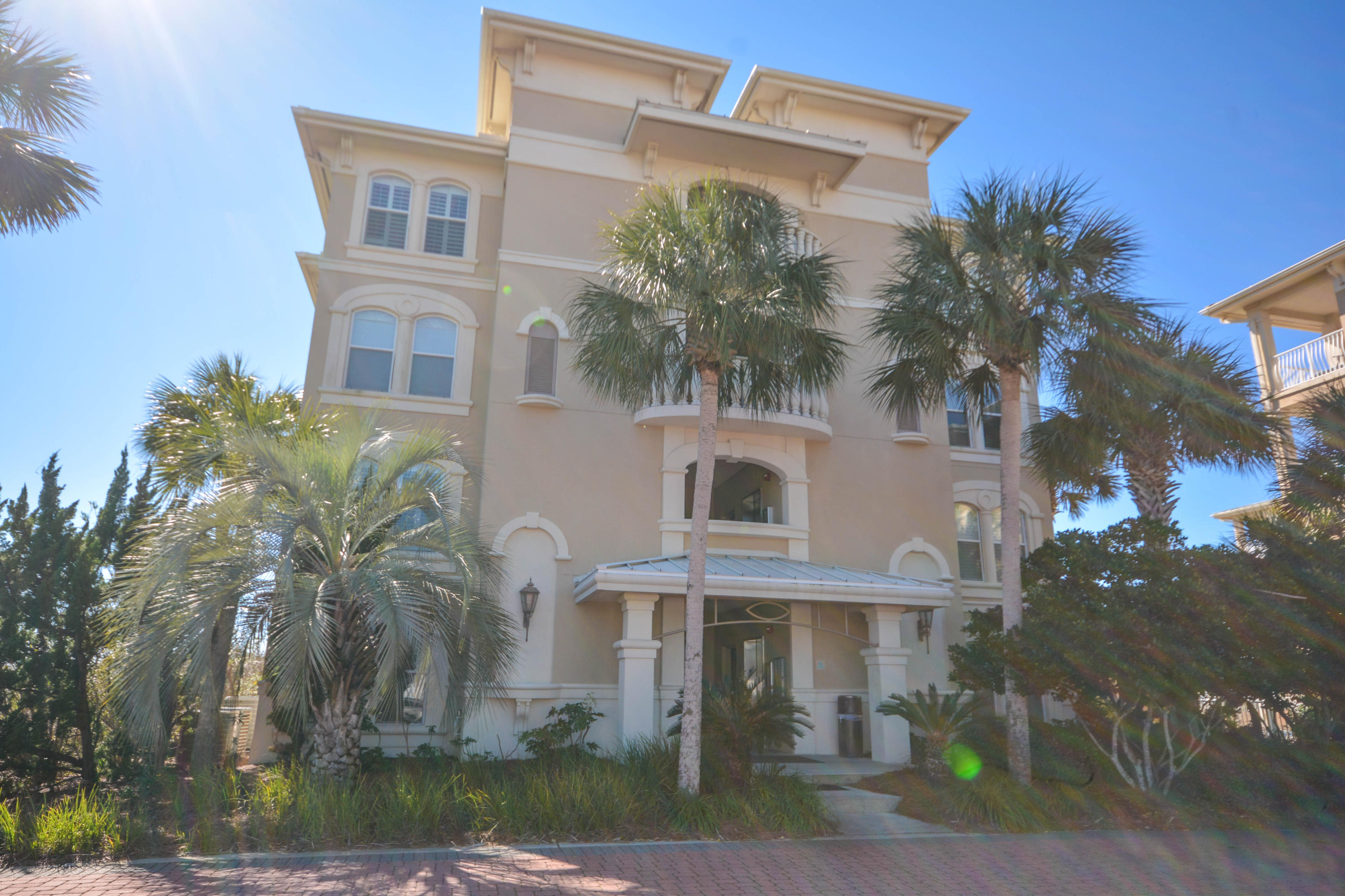 This premier Gulf Front furnished condo at the Villas of Sunset Beach is located in a small gated, three-building development on the east end of Scenic Highway 30A nestled between Rosemary and Alys Beach, one of the most popular stretches of 30A. This Never Rented, East-end, Top Floor condo is the perfect beach home or rental investment. With only two condos per floor and eight in each building, this spacious condo will easily accommodate your family and guests with three well-proportioned bedrooms. The tiled main living/dining areas face the Gulf with unsurpassed gulf views and opens onto an expansive 27' balcony. Enjoy over 240 feet of pristine beach frontage, take a swim in the Gulf side pool or just relax on the large covered balcony. Upgrades include a huge kitchen granite L-shaped