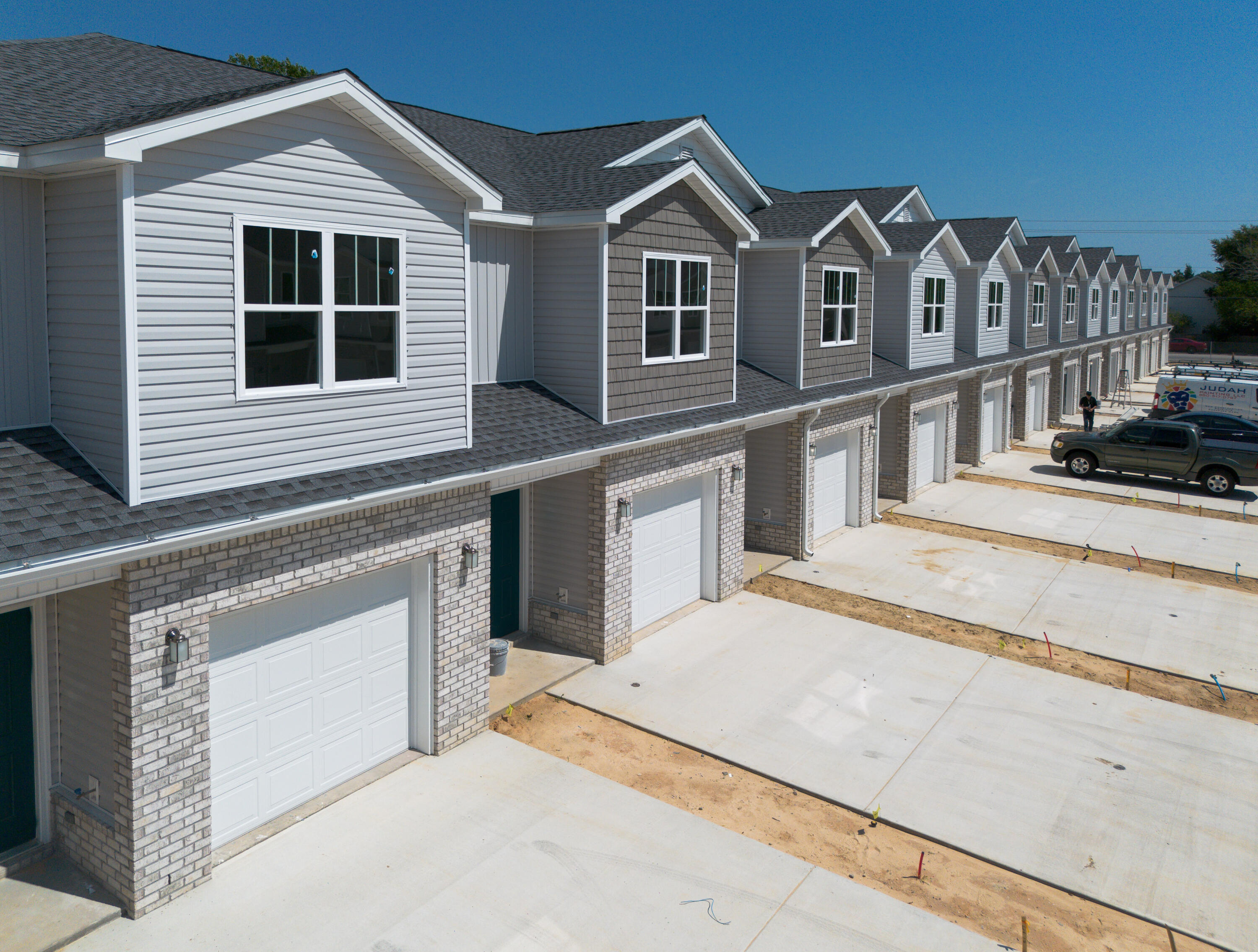 Brand NEW townhomes for sale in the heart of Fort Walton Beach! Orange Place offers 26 units in total, each with 3 bedrooms/ 2.5 bathrooms with an individual garage. This is unit 319-3, which is the second unit on your right. Downstairs you will find the living room, half bathroom, and a contemporary kitchen complete with Bianco Carrera Quartz countertops, soft close cabinets, and stainless steel appliances including a fingerprint resistant stainless steel side by side refrigerator. You will find LVP throughout the living and bathrooms, and plush carpet for comfort in the bedrooms. You are only a short drive away from the beaches, shopping, restaurants, Air Force Bases and more. There is an insurance quote attached for only $130.22/month. Make an appointment to come see a unit today!