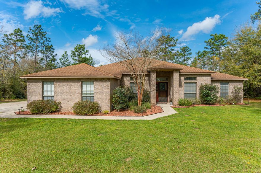 Looking for a spacious, gorgeous home with over an acre of land? Then you need to view this impressive, all-brick, 2736 sq.ft. home in the beautiful subdivision of Yellow River Plantation! Built in 2011, this turn-key ready home has 5 bedrooms/3 bathrooms with a side-entry garage and NO CARPET (Bamboo & Tiled Flooring). The sensational kitchen offers stainless-steel appliances, granite counter tops, tiled back-splash, large pantry, pot rack and kitchen island. This spacious floorplan has 10' ceilings along with 2 living areas AND a formal dining room plus a screened-in back porch. Of the 5 bedrooms, the HUGE master suite offers double-vanity sinks, garden tub, separate tiled-shower, separate toilet area and his/her closets. The hallway adjacent from the living room connects three spacious