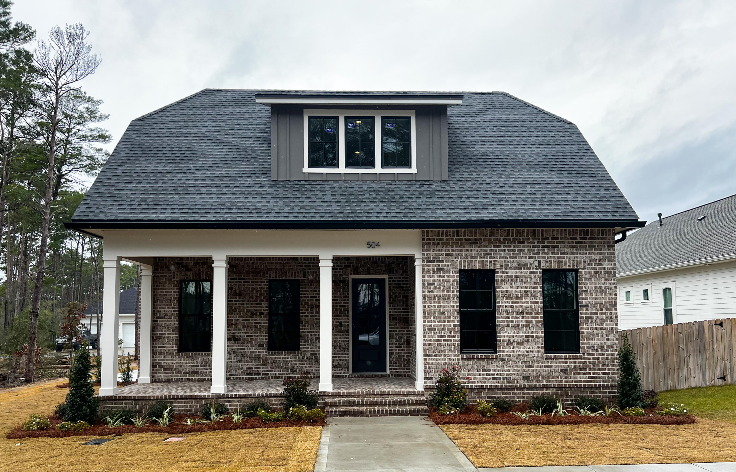 Discover this stunning new 4-bed, 3.5-bath home with 2,834 sq. ft. of thoughtfully designed living space. This home has an open floorplan, wood floors throughout, a gas fireplace in the living room, and a kitchen with quartz countertops and wood cabinets extending to the ceiling. The upstairs offers a versatile bonus room, perfect for entertaining, alongside a private 4th bedroom and bath. The luxurious primary suite features a freestanding tub, shower, dual vanity, and a spacious walk-in closet. Relax on the front and side porches. This home is also just steps from the new Deer Moss Creek clubhouse with a pool, playground, and basketball court.