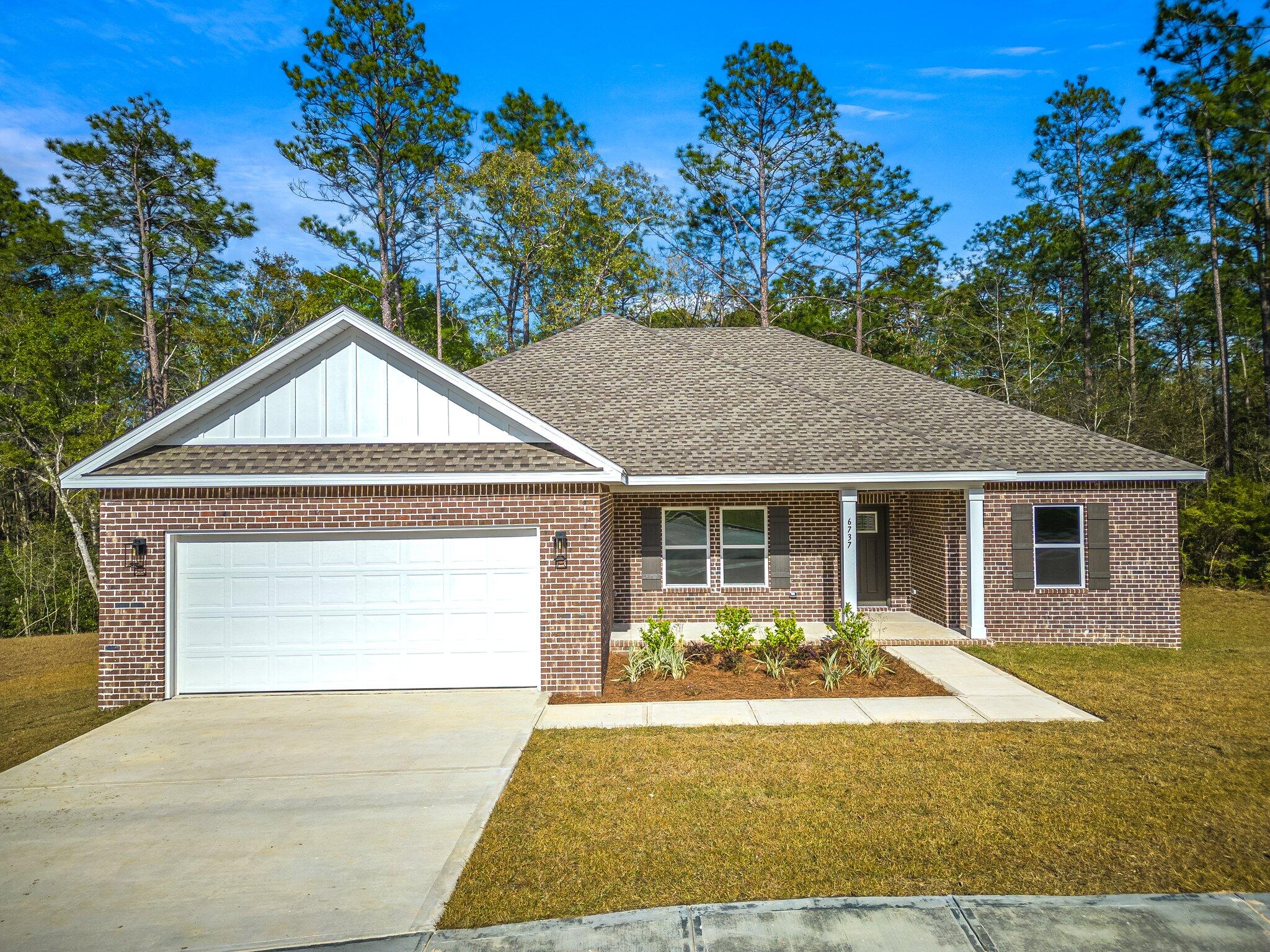 All brick 4 bedroom home on a half acre lot! Located in Heritage Plantation. Phillips Homes is a semi custom builder and not a production home. Under construction estimated completion March. The Lynn plan features 4 bedrooms/2baths split plan. Upgrades are considered standard in this home. The kitchen features Carrara Quartz counters, large island, stainless Frigidaire appliances, breakfast bar, all white shaker cabinets, pantry, stainless cabinet hardware, push button garbage disposal, and recessed lighting. Premium CoreLock flooring and Dreamweaver Azure carpet with upgraded padding. Sherwin Williams 'eggshell' custom Snowbound paint color. Just to name a few upgrades! Enjoy the great outdoors from the covered porch. Big yard with brick fire pit ready to go! Just bring the marshmellows!