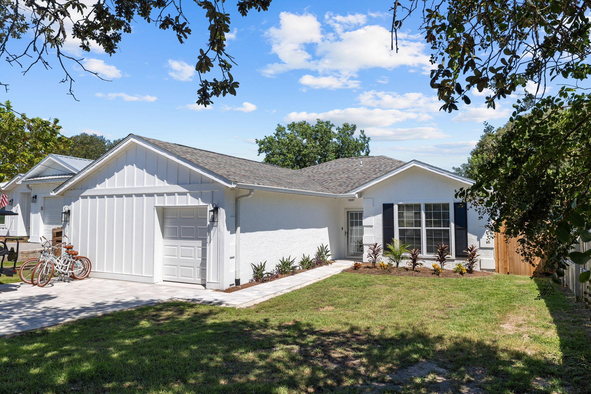 Experience an elite coastal lifestyle only seven minutes from 30A! This peaceful haven is positioned on a beautiful street just a short golf cart ride from the beach. This stunning getaway can be a quaint escape for you and your family as well as a top-producing rental property with projections at $72,988 and cash on cash return projections at 6% per year. Beautifully designed, the home offers a modern blend of indoor and outdoor living spaces. Serving as a perfect seaside retreat, 21516 Dolphin Avenue features easy public beach access and a private heated pool. The chef's kitchen showcases floating shelves, quartz countertops, and a stainless steel kitchen hood. Positioned just minutes from Alys Beach, Rosemary Beach and Seacrest Beach, this home sits in a perfect location to enjoy a peaceful sanctuary while also being close to all the top dining, shopping and entertainment options on the east end of 30A. Offered fully-furnished, this property can be a lucrative investment property and comes with strong rental history. Explore this sanctuary designed for relaxation, connection and unforgettable memories on the coast!