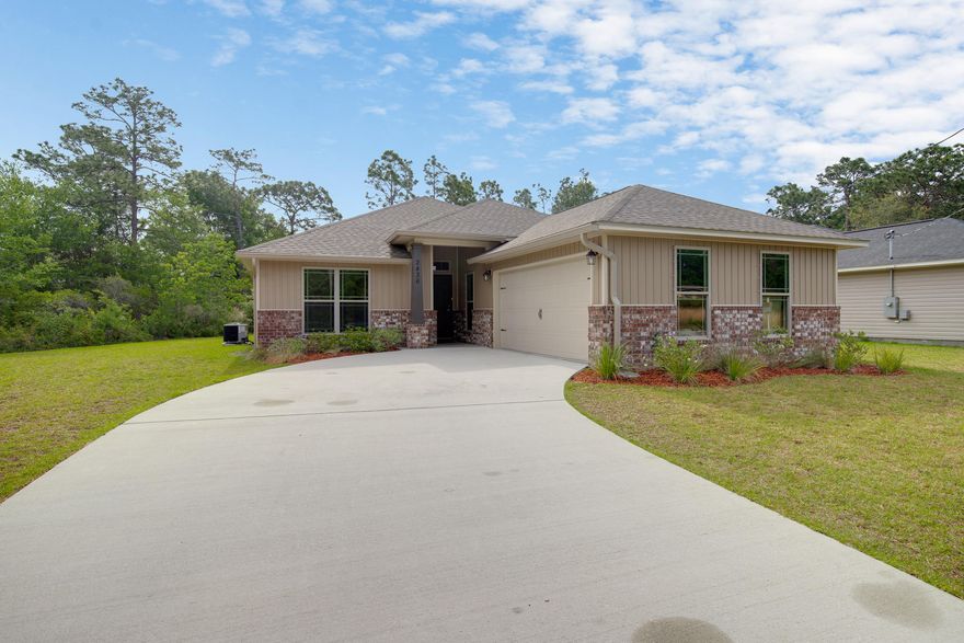 Better than New! 3 Bedroom / 2 Bath PLUS Office or Bonus Area! Make this Beautiful Home in the Heart of Navarre yours Today! Features include: Vaulted Ceiling / Spacious Open Floor Plan / Wood Look Vinyl Floors in Living Areas / Granite Countertops in Kitchen / Stainless Appliances / Ceiling Fans / Covered Patio / Large Back Yard / Side Entry 2 Car Garage / Indoor Laundry Room / Hurricane Protection! Master Bath Features: Double Vanities / Garden Tub and Separate Shower / Walk in Closet. Conveniently located to Shopping and Restaurants and only 5 minutes to the Beach!~Buyer to verify all information and dimensions.