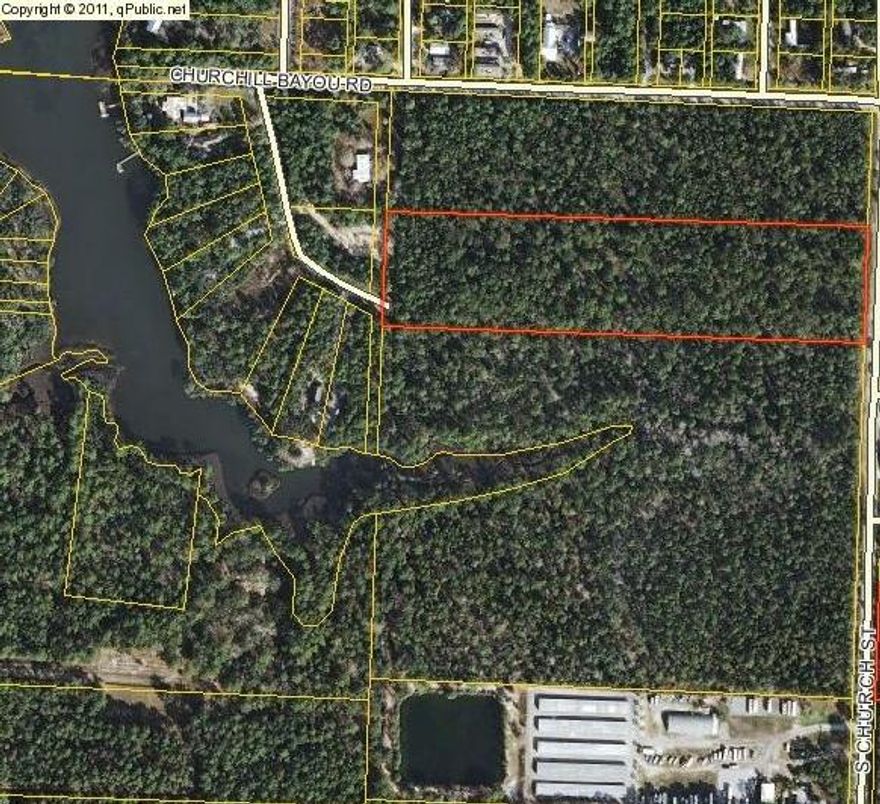 Approximately 10 wooded acres of land on Church Street. Located not far from Hogtown Bayou and Cessna Park with picnic tables, basketball court, boat launch and the beautiful bay. Also near the beach, shopping and Sacred Heart Hospital. This parcel is zoned conservation residential. Buyer will need to have a wetlands study and is responsible for their own due diligence.