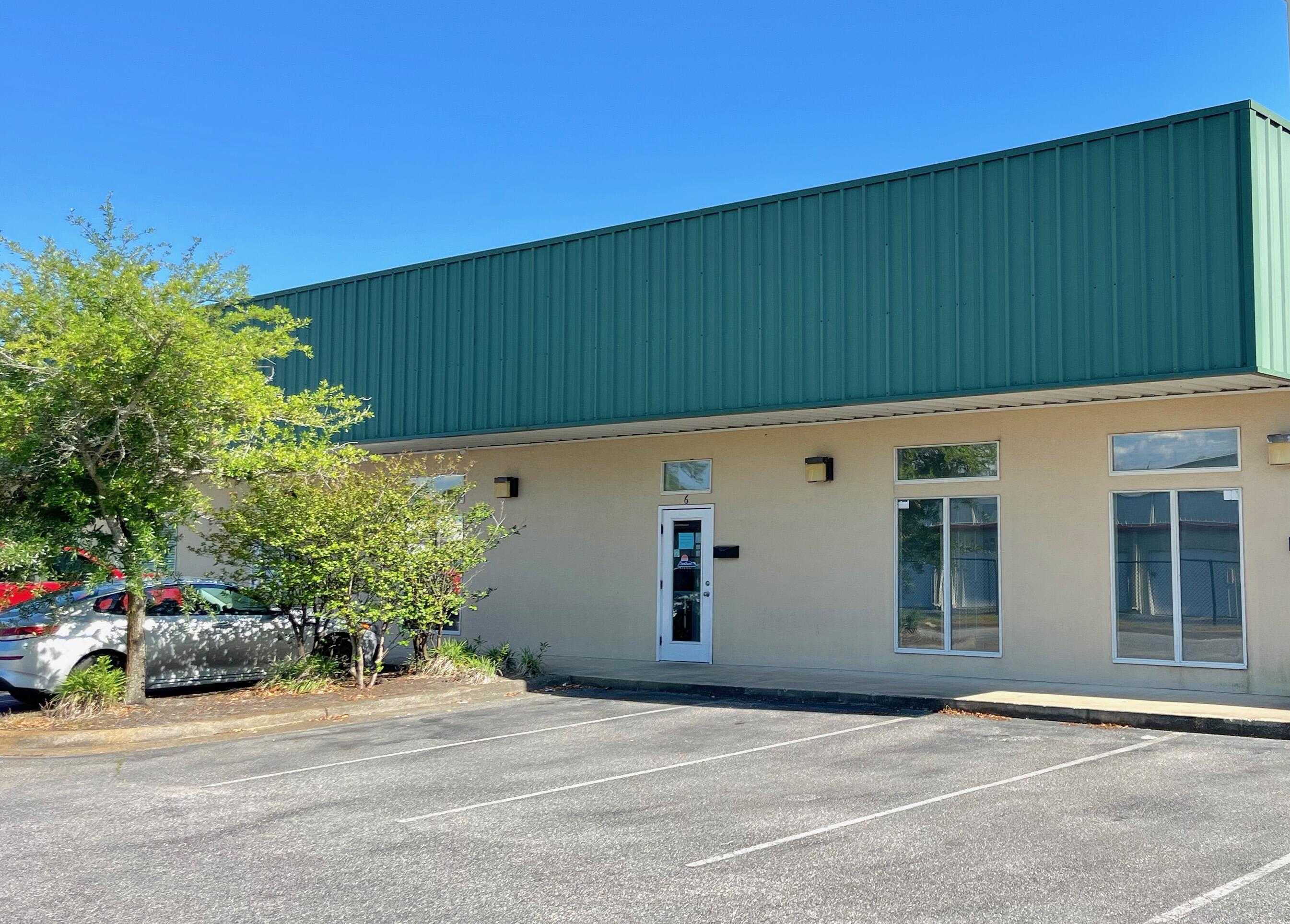 Available for purchase- 2,000sf office warehouse with State Certified Catering License. This commercialcondo is comprised of 4 offices with a break room and an 800sf (+/-) sf warehouse. The warehouseportion has an 11ft overhead door and a 1,000sf mezzanine for storage.