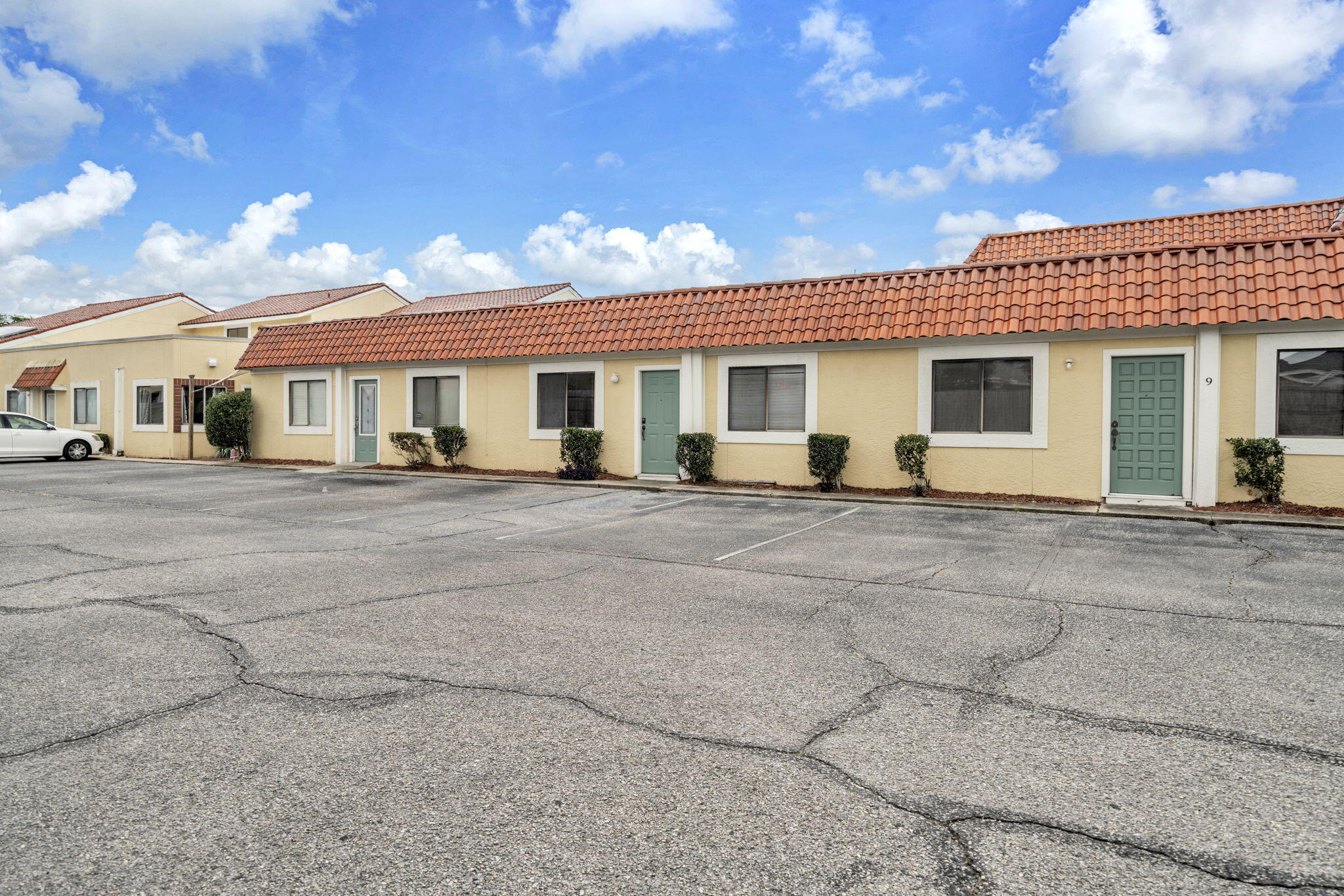 CASH FLOW! TWO RENOVATED OFFICE SPACES FOR THE PRICE OF ONE. Occupy the entire space or use one unit & rent the other! Front space currently leased for $800/month. NO elevators & LOW $1044 per year CAM. Very professional Spanish style SINGLE story office complex in the heart of Destin w/easy access to highway 98. LOW density complex w/9 total units. Newly renovated with new LVP & marble flooring, freshly painted interior, TWO renovated bathrooms (1 with custom shower) plus private front & back entrances both w/plenty customer parking provide an ideal opportunity for one or two Tenants. Large, 1809 sf floor plan includes large reception area, 4 offices, large conference rm, file rm, sauna, and 2 bathrooms (1 w/shower). Two newer HVACs & newer tile roof provide peace of mind.