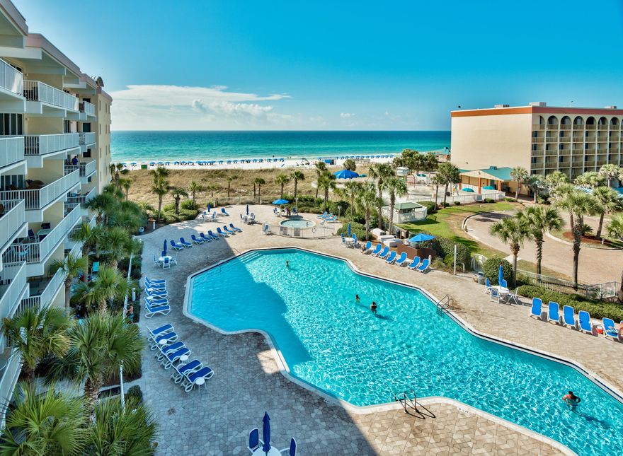 PREMIUM LOCATION IN GULFSIDE COMPLEX OF DESTIN WEST!!! This unit is located on the 5th floor in the curve with Fantastic views of the GULF & Pool! It is also in close proximity to the elevators, without being right on top of them. Unit is being Sold Furnished & RENTAL READY with a few minor exceptions. The Master Bedroom offers a King Size Bed & features an en-suite private Master Bathroom with Tub / Shower combination. It also has a tucked away Bunk Area with 2 single bunks & Access to the 2nd Bathroom with Shower. The living room has a Queen Size Sleeper Sofa, making the unit capable of sleeping up to 6 guests. The unit has recently been painted, exterior HVAC Compressor was replaced in 2014, interior HVAC system is a Trane, there is a new refrigerator, & New Flat Screen TVS. READ MORE.. The unit offers a stackable washer & dryer and enclosed laundry closet. 

The Gulfside Complex offers a multi-story covered parking garage with ample place to park on a first come basis (no assigned parking). Destin West Beach and Bay Resort is the Premiere Resort Destination on Okaloosa Island! The complex spans both the beach and bay front and is connected by a Skybridge over Highway 98. The Gulf Side boasts a 5,000 sq. ft. gulf front lagoon style pool, kiddie pool, hot tub, fitness center, and BBQ grills all with a view of the Gulf of Mexico. There are Kids Programs and affordable Beach Services during the summer to include chair & umbrella rentals, paddle board, kayaks, and wave runner rentals. The Bay Side shines with its 700 ft lazy river, central pool with waterfall, two over-sized hot tubs, and BBQ grills, all with a view of the Choctawhatchee Bay. Owners & Guests have access to the amenities on both sides of the complex. You also have access to the amenities of the Ramada Beach Resort next to the Gulfside complex, which includes a Grotto Pool, kids Splash Garden, & the Garden Cafe. 

This unit offers a solid rental history and is offered Rental Ready.... Or you can make this your perfect primary, 2nd home, or vacation getaway! DON'T MISS THIS OPPORTUNITY TO OWN THIS PRIME BEACH FRONT CONDO & START LIVING YOUR BEACH DREAMS!!!