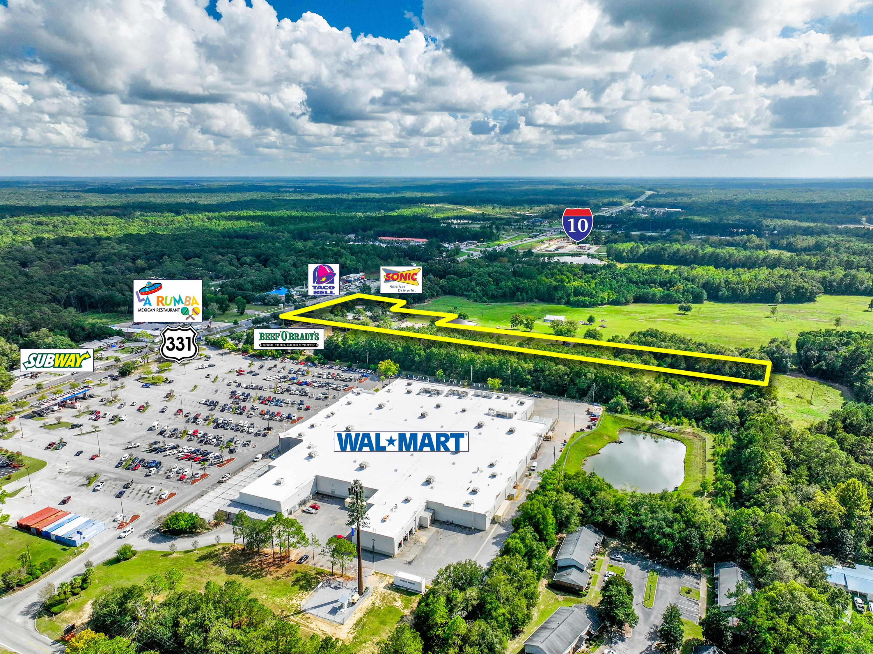 NEW LISTING! ZONED COMMERCIAL! 4+/- acres of prime land positioned within the rising market and city limits of DeFuniak Springs of Walton County, Florida. Offering exceptional visibility with over 340+/- feet of frontage on U.S. Highway 331, this property is ideally situated just 1/2 mile north of Interstate 10--a strategic location providing direct access to South Walton, Destin, Fort Walton Beach, Panama City, Niceville, Eglin AFB, and Crestview.This site presents outstanding potential for future commercial development or investment. The property also offers the possibility of assemblage with adjacent parcels, expanding the opportunity even further. All existing structures convey ''as is.'' Listing Agent holds an interest in the property. Existing Survey is located under the ''Document'' tab.