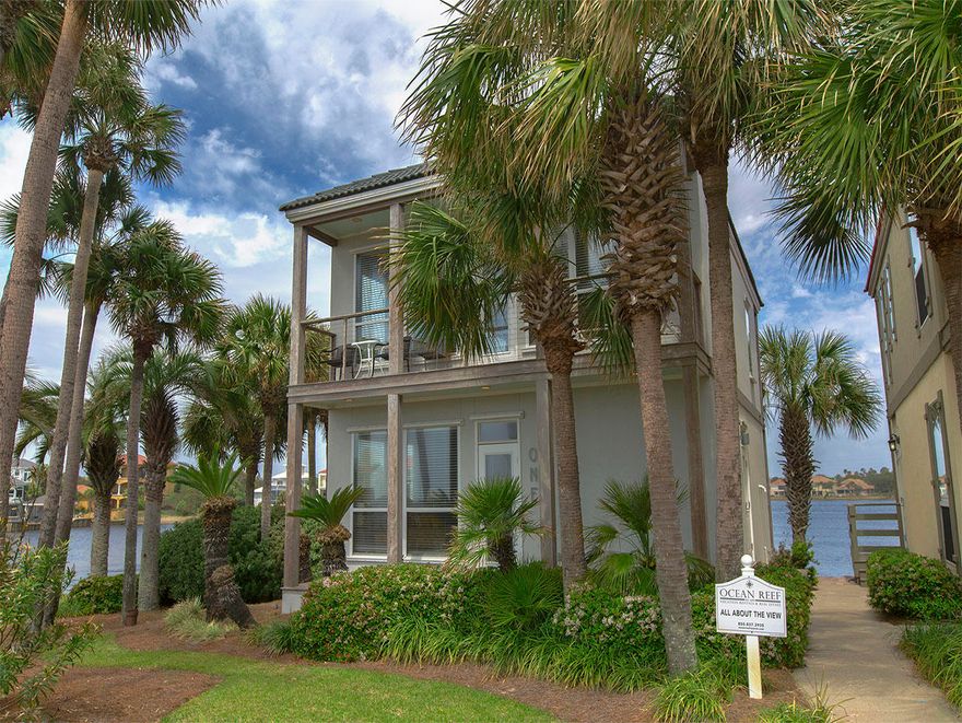 ''All About the View'' is the perfect name for this unique home located in the Destiny Beach Villas. This home is ideally located between the Gulf of Mexico and a large coastal dune lake named Four Prong Lake. Two master bedrooms on the first level, one with great views of the Lake and the other with great views of the Gulf. The living, dining and kitchen area is very open with numerous windows that offer spectacular views of the Gulf and Four Prong Lake. Both the front and the back of this property have a porch and a balcony for relaxing and enjoying the views. The many features include hardwood floors, paddle fans, stainless steel appliances and a spacious hardwood bar on the kitchen island. Destiny Beach Villas has 2 pools for your enjoyment and also easy access to the beach