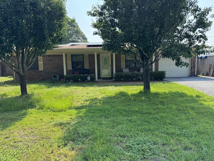 Brick, one-story with 3 bedrooms, 2 baths, 1764 square feet, corner lot, with sunroom and pool.