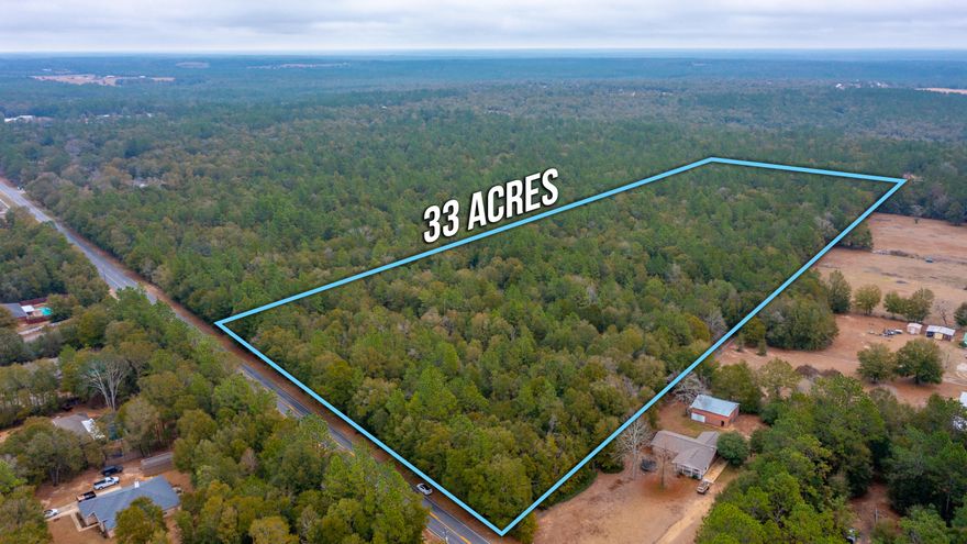 This is the land you've always dreamed of!  Over 33 acres of gorgeous, flat land on a paved road with utilities on hand!  Beautiful hardwoods for privacy, perfect for your dream home.  Or for money making opportunity, divide and build more!  Property is zoned for 1 acre tracts.