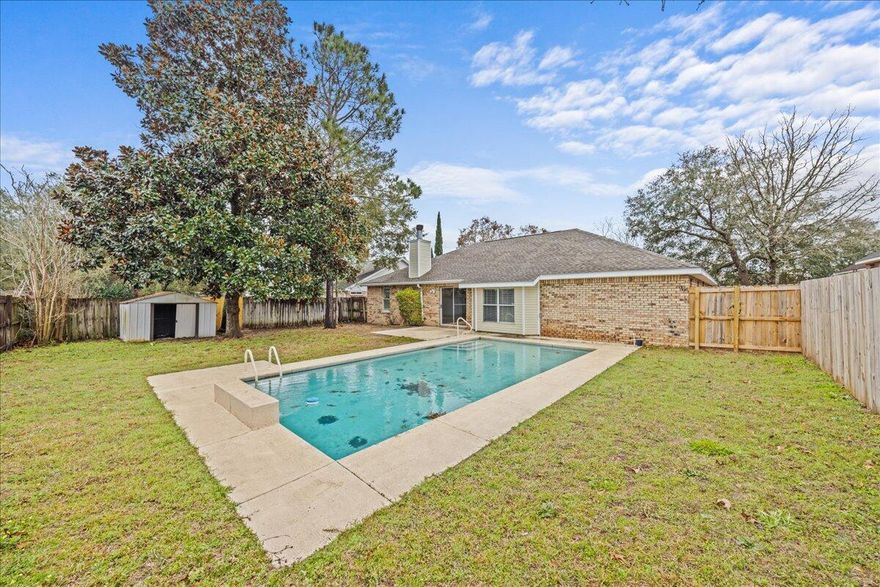 **IN-GROUND POOL**Wonderful home conveniently located on the south side of Crestview. This 3 bedroom, 2 bath home offers a split floor plan, PLUS an office/flex room, formal dining room, breakfast nook, and laundry room. Wood laminate floors throughout the main areas and new carpet in the bedrooms. The kitchen offers newer stainless steel appliances, breakfast bar, and separate pantry. Huge fenced in yard with sparkling GUNITE POOL with waterfall and shed. HVAC 2016, water heater 2007,