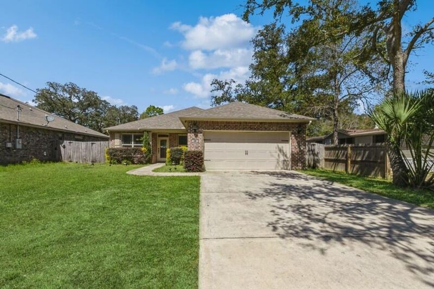 Stunning Home in the Heart of Fort Walton Beach!Step into this beautifully updated home, where style meets function! The kitchen is a dream with semi-custom cabinetry, sleek granite countertops, and top-tier stainless steel appliances. You'll love the spacious pantry and gorgeous wood-look tile flooring throughout. Matte black hardware adds a bold, modern touch to every room.Your private oasis awaits in the spacious primary bedroom, complete with a luxurious en-suite featuring double sinks and a relaxing garden tub.Entertain in your fully fenced backyard--perfect for weekend BBQs or quiet evenings under the stars.Hurry, this gem won't last long! Schedule your showing now and make it yours before someone else does!