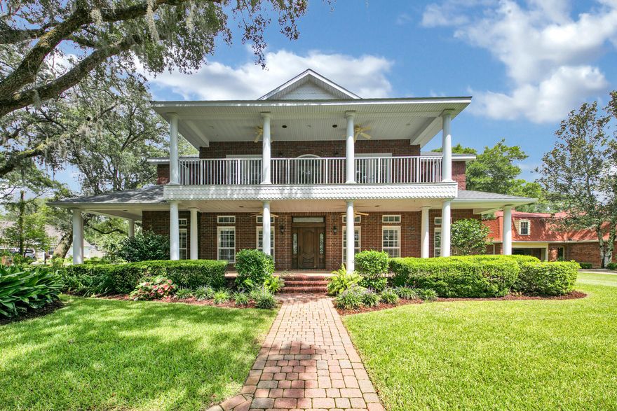 Stately and spacious custom home now available in the ever popular Kenwood Subdivision!!! 111 Troy Circle is perfectly nestled on an ideal homesite and adorned with several mature Oak Trees.  Spectacular architecture features large wraparound porches, covered balcony, and expansive, screened-in lanai and saltwater pool deck with spa.  Custom, brick paver driveways and sidewalks welcome you to the large 3 car garage.  Other exterior features; lush landscaping, gas lanterns at pool deck, 2 separate driveways and security system.  The spacious floor plan boasts 6 bedrooms, 5 bathrooms, many storage closets,  multiple living areas, formal dining room, breakfast area, soaring ceilings in the main living area with built-ins, large storage area above the 3-car garage, large laundry room and